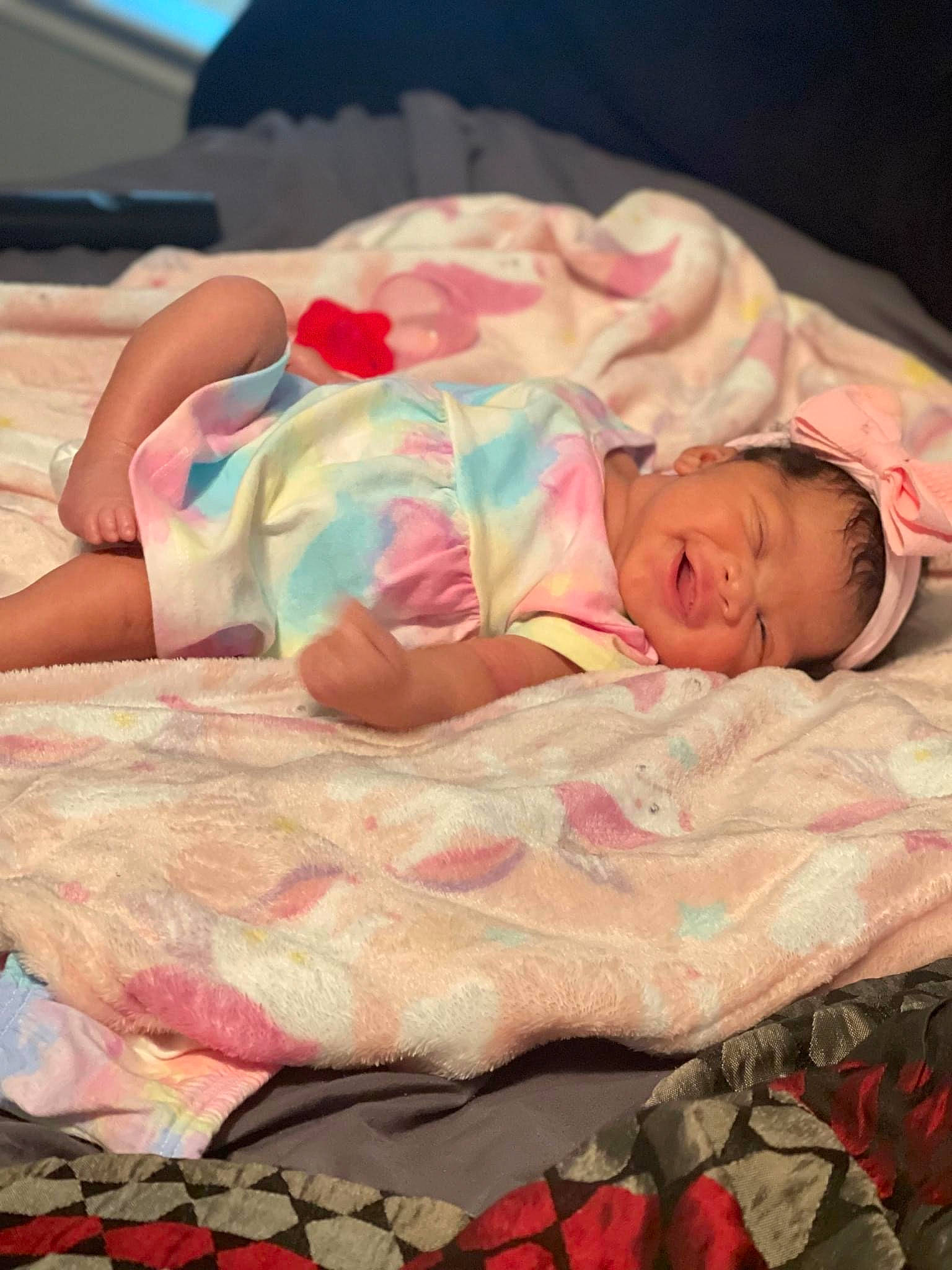 Avianna joined the competition — help win amazing prizes! baby, baby_toddler_clothing, bedding, bedtime, carmine, cheek, child, comfort, flesh, flooring, human_body, human_leg, linens, person, pink, red, room, skin, textile, thigh