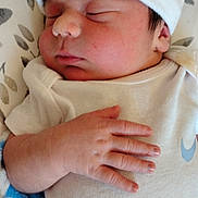 Chase is registered to the contest to win money with this photo: newborn, baby, sleeping, hat, hand, blanket, clothing, infant, peaceful, cute, portrait, resting, soft, cozy, indoors, child, person, closeup, skin, young