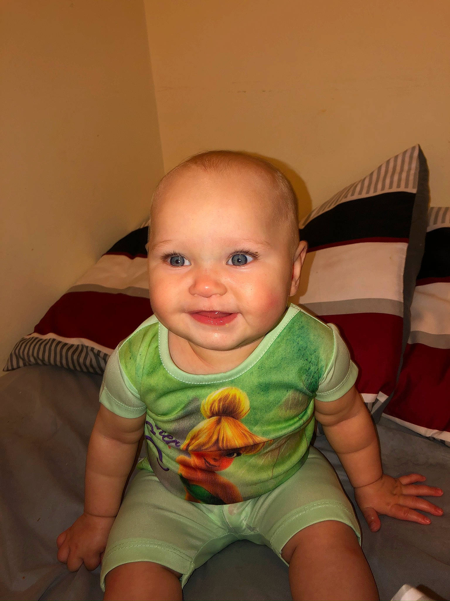 Calanah is registered to the contest to win money with this photo: arm, baby, cheek, child, eye, finger, head, iris, joy, mouth, muscle, person, sitting, skin, smile, thumb, toddler