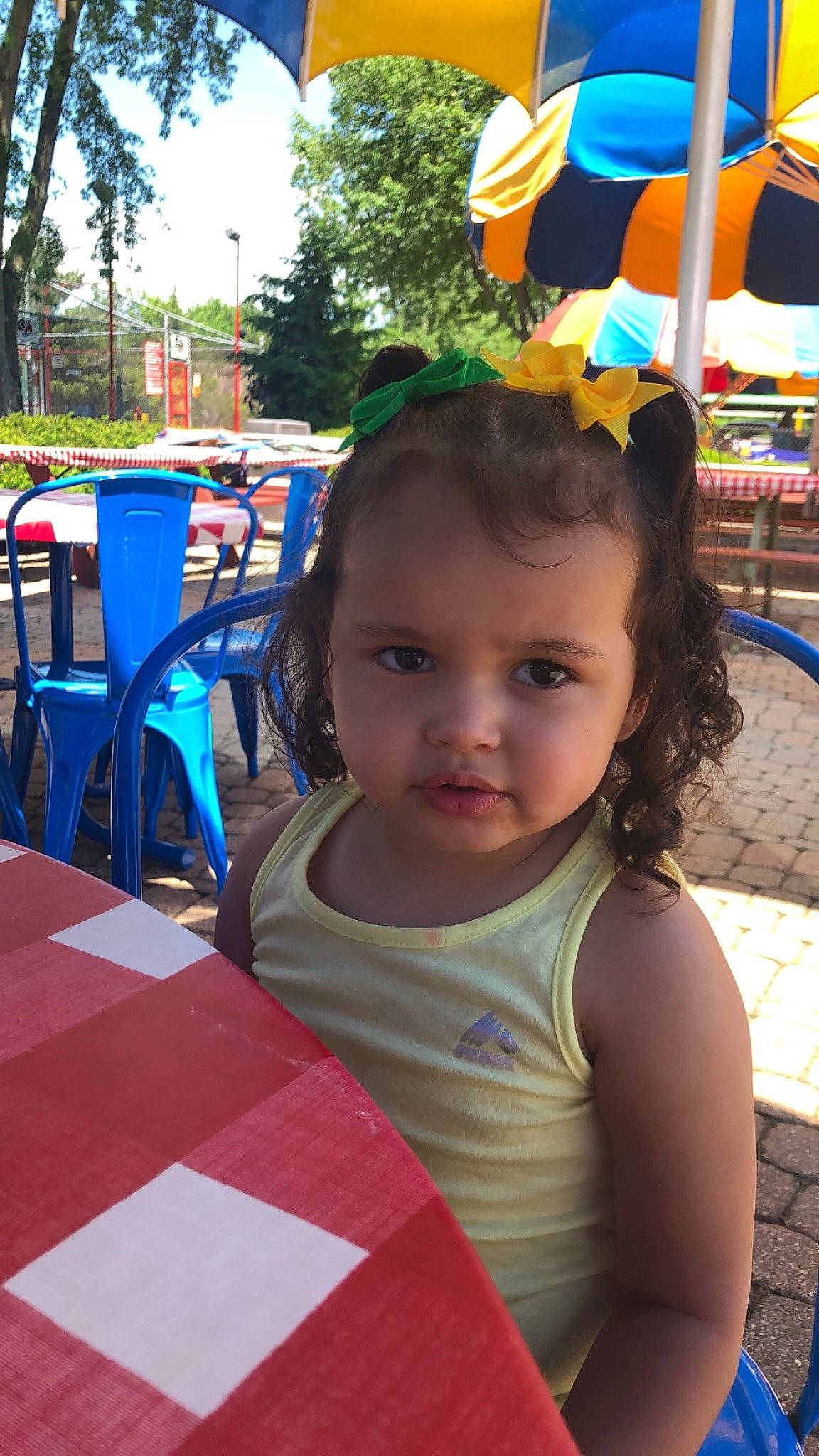 Camyah is registered to the contest to win money with this photo: amusement_park, amusement_ride, child, face, fun, games, hair, hairstyle, head, leisure, park, person, play, playground, public_space, recreation, smile, summer, toddler, vacation