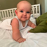 Romee joined the competition — help win amazing prizes! baby, infant, child, bed, white_bedding, pillow, crib, arm, face, skin, cute, smile, indoor, room, furniture, person, closeup, sleepwear, head, expression