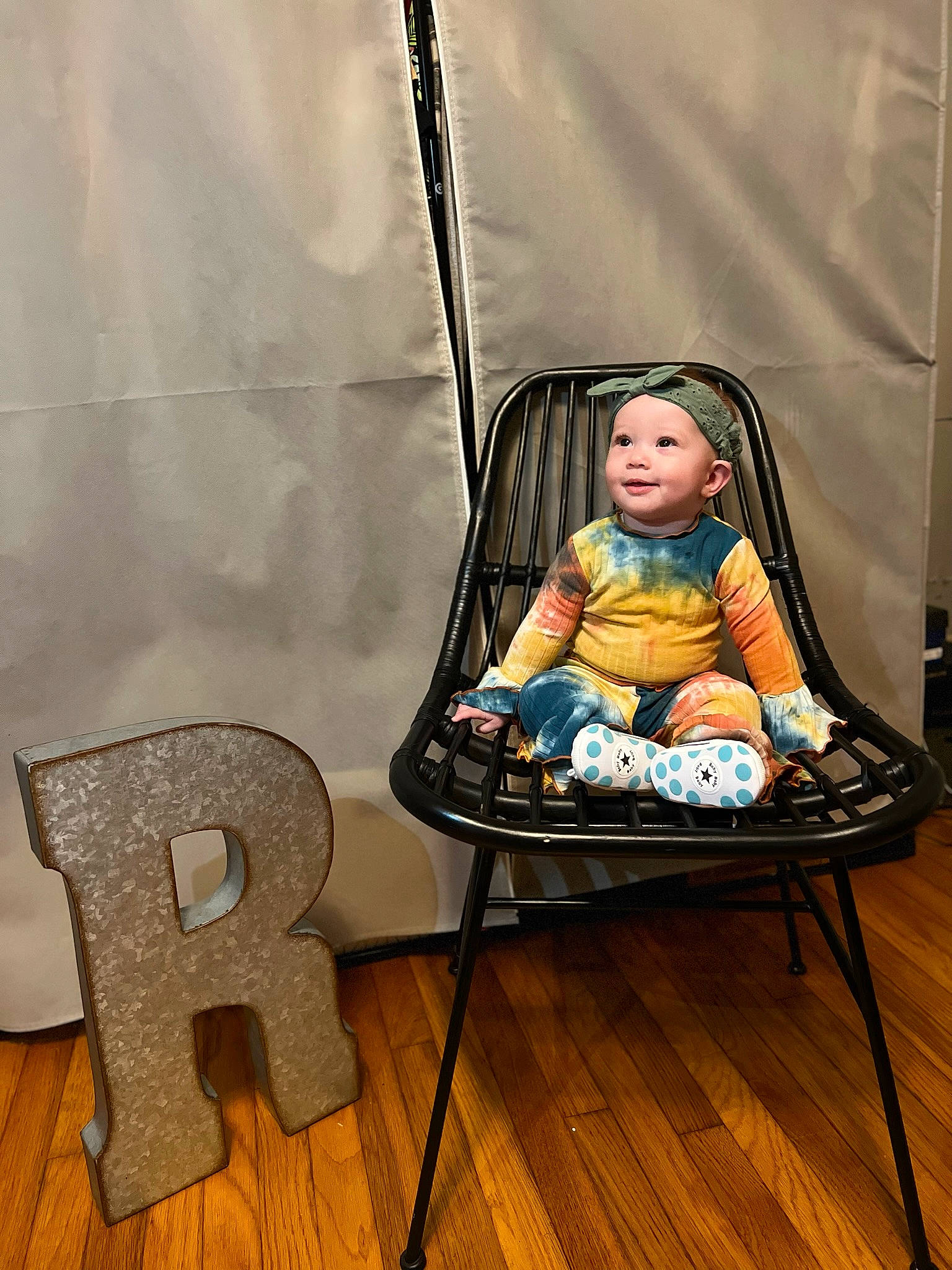 Rhami is registered to the contest to win money with this photo: baby, baby_carriage, baby_products, baby_toddler_clothing, chair, child, comfort, eye, face, flooring, fun, furniture, hardwood, head, headwear, joy, leisure, person, product, room