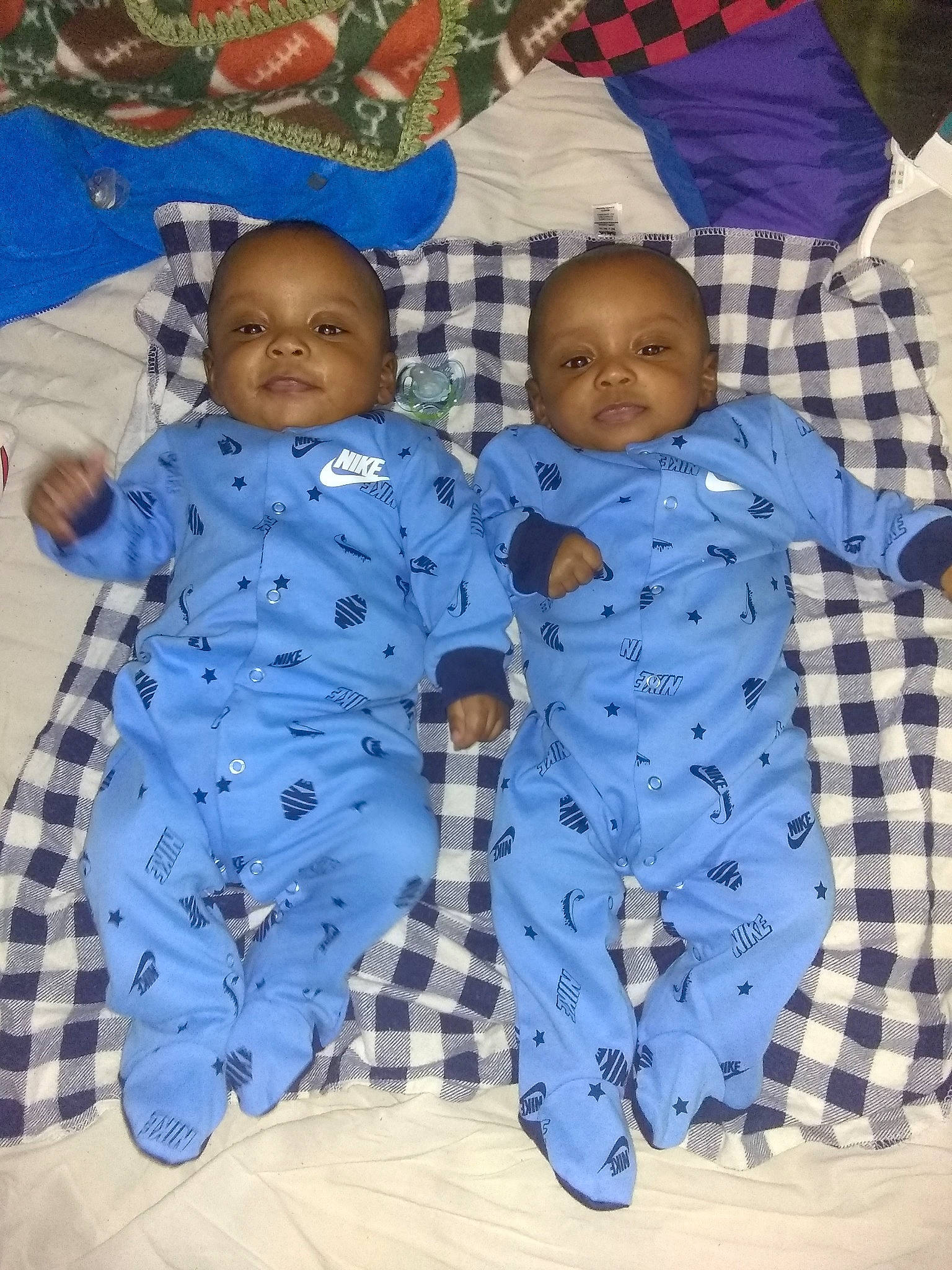 Dayveon' Jayveon is registered to the contest to win money with this photo: baby, baby_toddler_clothing, blanket, blue, child, design, linens, pajamas, pattern, person, plaid, play, quilt, sibling, sleeve, smile, textile, toddler