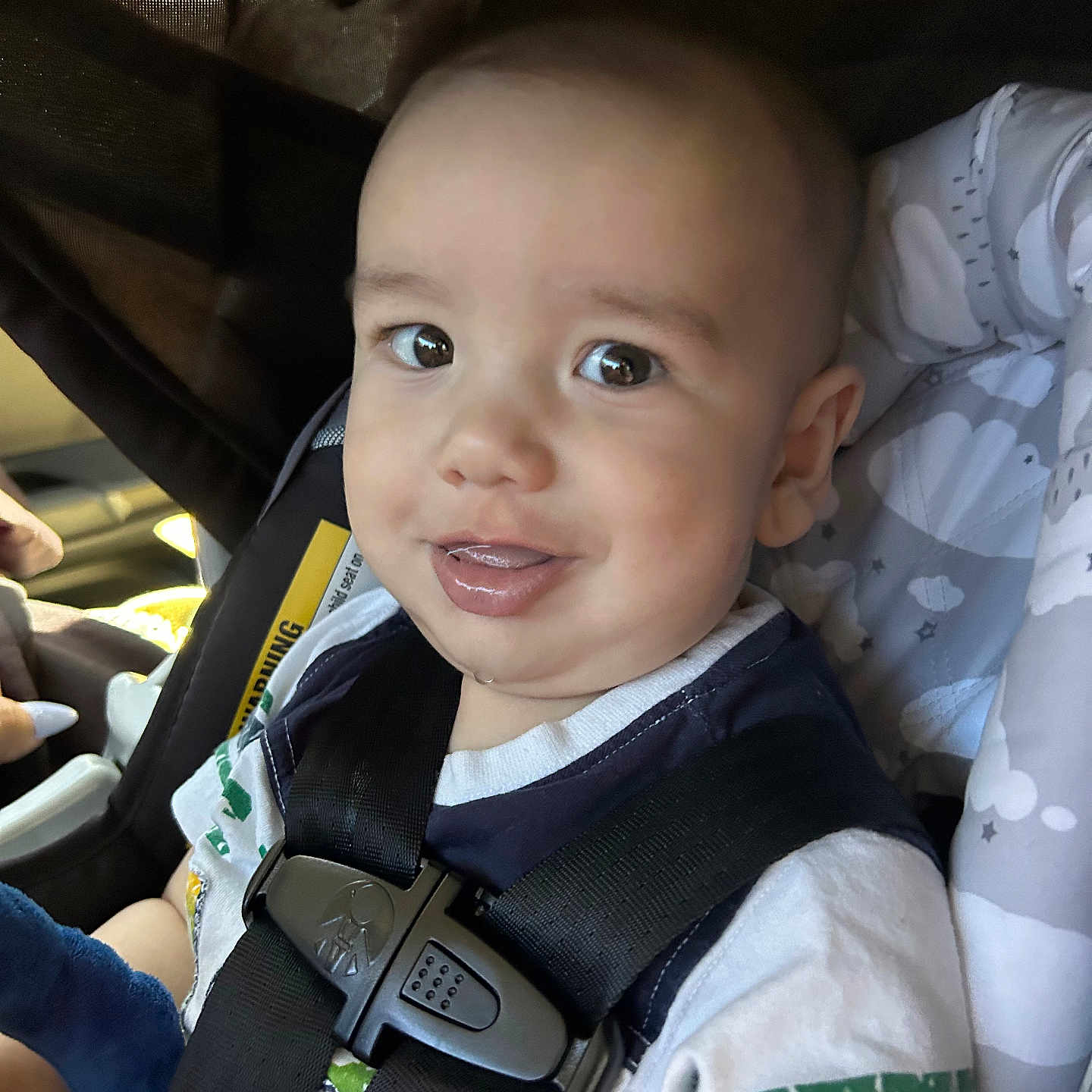 Nathaniel joined the competition — help win amazing prizes! accessories, baby, babylaughing, belt, car, car_interior, clothing, cushion, face, happy, head, homedecor, person, photography, portrait, smile, strap, transportation, vehicle, vest