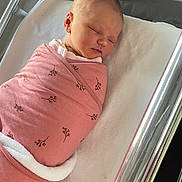 Jade participe au concours pour gagner de l'argent avec cette photo : newborn, baby, swaddled, pink_blanket, sleeping, hospital_bassinet, infant, face, peaceful, resting, chrome_rails, white_mattress, name_card, tiny, child, wrapped, bed, cute, soft, portrait