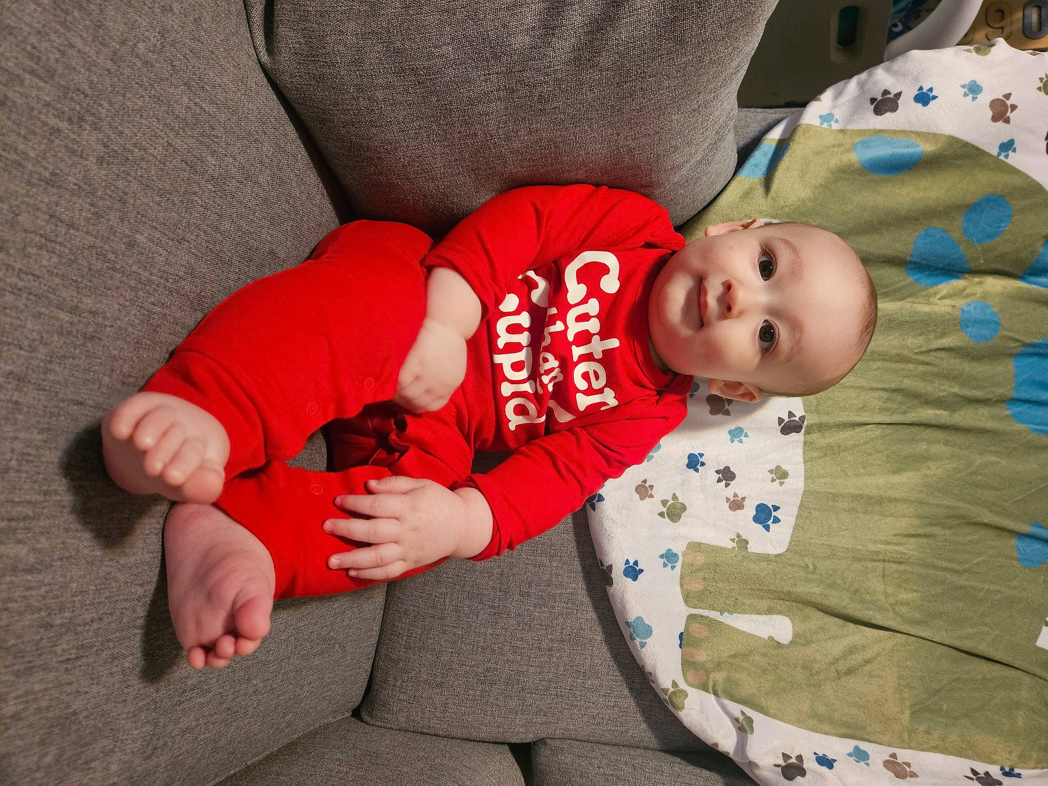 Dominic joined the competition — help win amazing prizes! baby, baby_toddler_clothing, carmine, child, comfort, couch, elbow, foot, fun, human_leg, knee, lap, linens, person, sitting, sleeve, smile, thigh, toddler, vertebrate