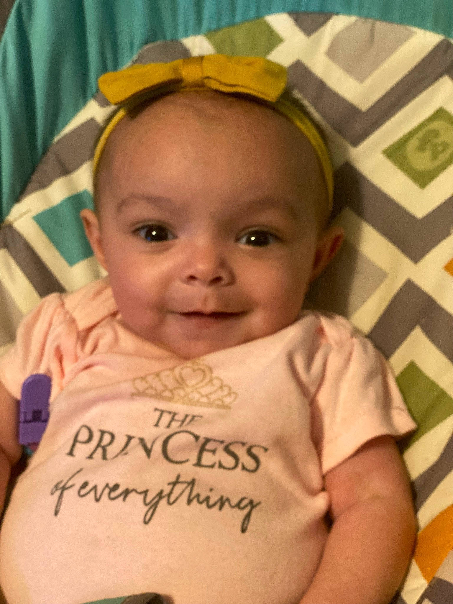 Gabriele is registered to the contest to win money with this photo: baby, baby_toddler_clothing, cheek, child, chin, close_up, eye, eyebrow, eyelash, forehead, fun, handwriting, happy, iris, joy, lip, person, skin, sleeve, smile