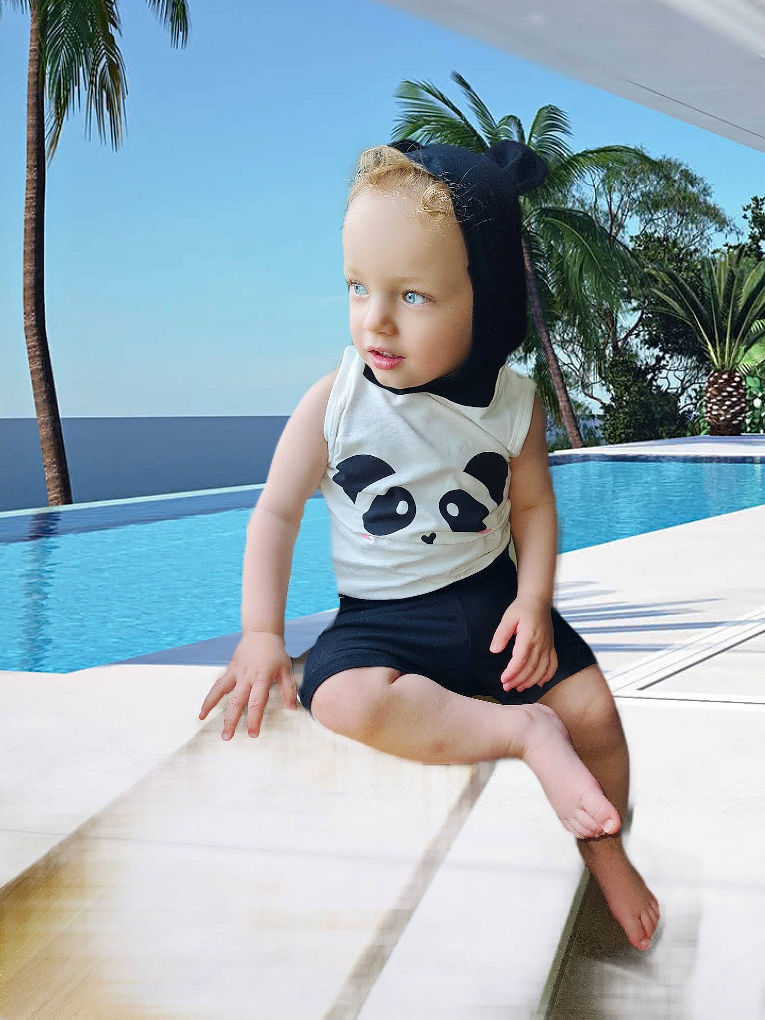 Bryan participe au concours pour gagner de l'argent avec cette photo : azure, baby_toddler_clothing, barefoot, black_hair, child, foot, fun, happy, human_leg, knee, leg, leisure, palm_tree, person, skin, sky, sleeve, swimming_pool, thigh, toddler