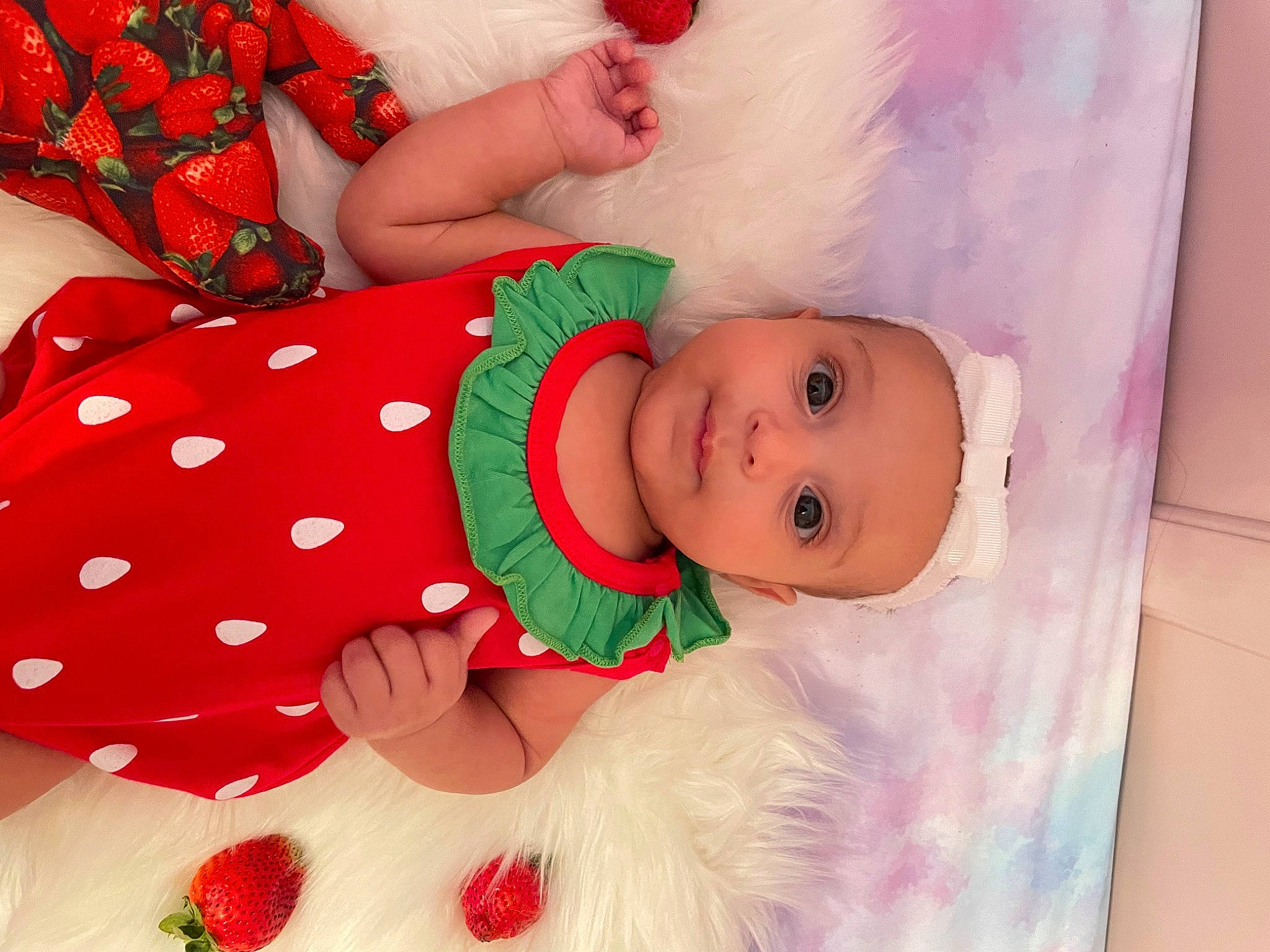 Julia joined the competition — help win amazing prizes! baby, baby_safety, baby_sleeping, baby_toddler_clothing, child, comfort, event, hand, happy, head, headwear, linens, pattern, person, pink, product, red, skin, sleeve, textile