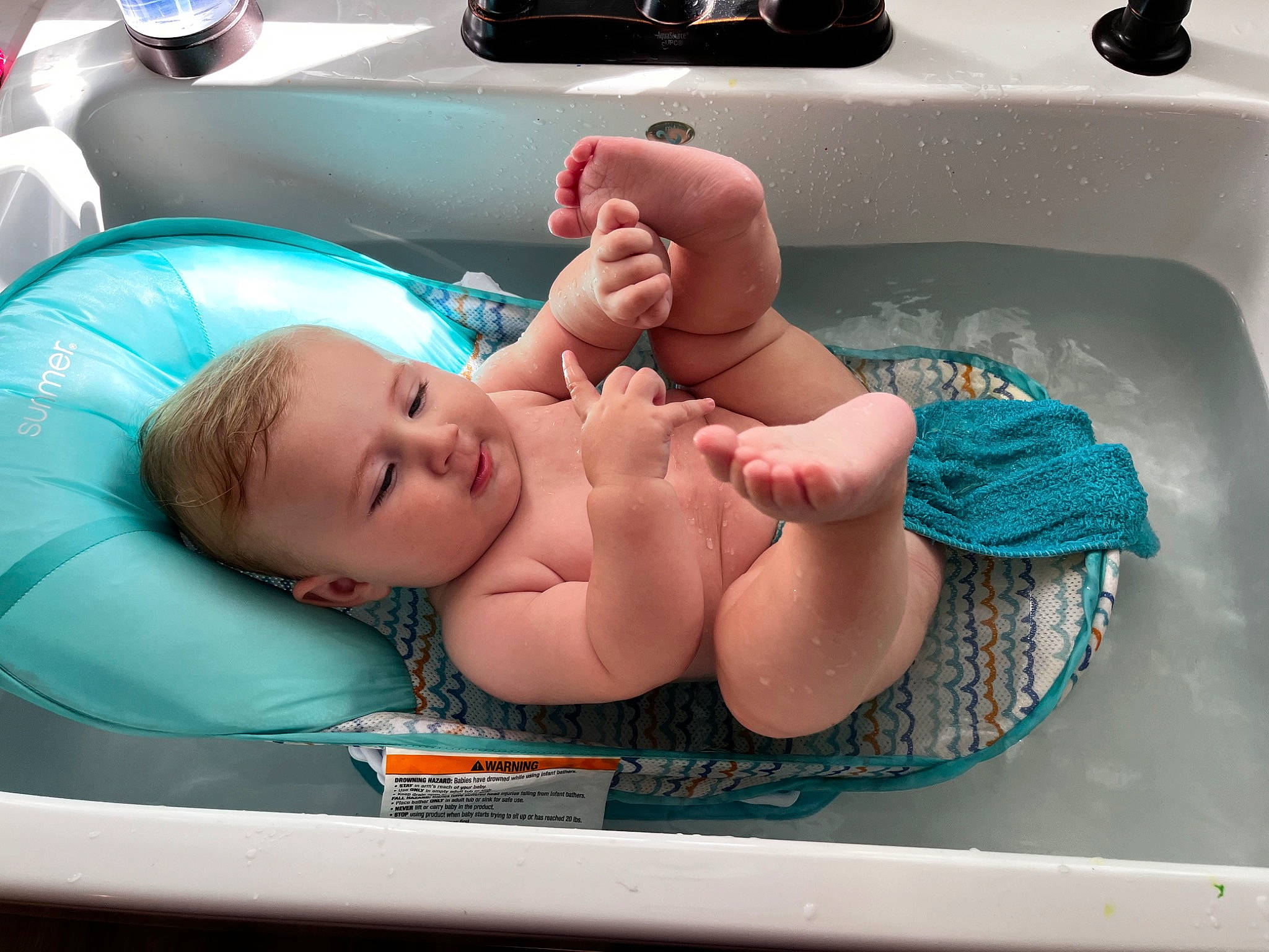 Brody is registered to the contest to win money with this photo: baby, baby_float, baby_products, bathing, bumper, chest, child, comfort, event, fun, happy, inflatable, jacuzzi, leisure, person, plumbing_fixture, product, recreation, smile, swimming_pool