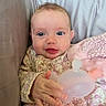 Airis Elaine is registered to the contest to win money with this photo: baby, blanket, child, clothing, comfort, couch, cute, expression, face, fingers, hand, indoor, infant, person, pillow, skin, smile, soft, toy, young