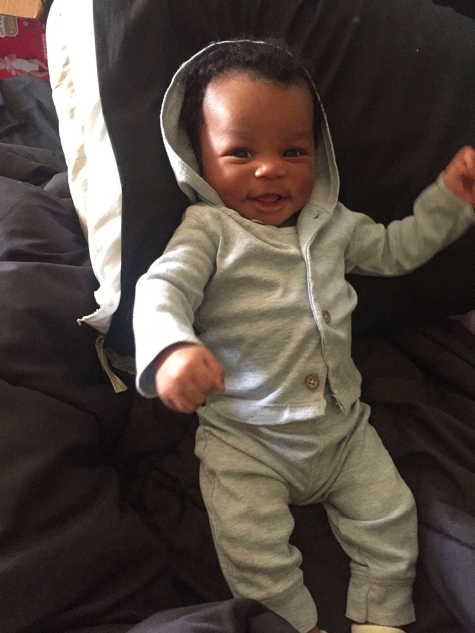 Asiah joined the competition — help win amazing prizes! baby, baby_products, baby_toddler_clothing, cheek, child, comfort, face, fun, gesture, happy, person, sitting, skin, sleeve, smile, thumb, toddler