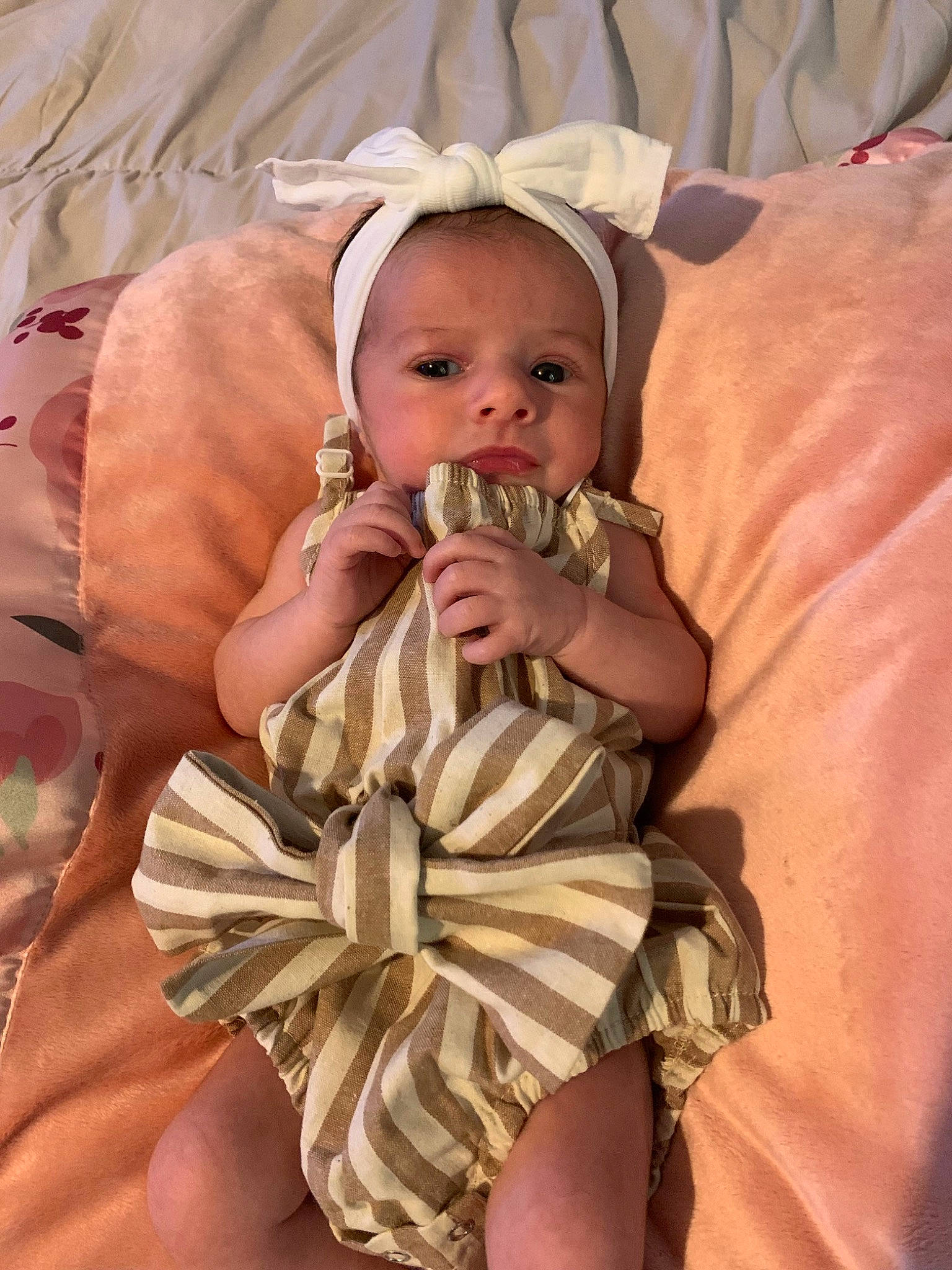 Ellyana is registered to the contest to win money with this photo: baby, baby_toddler_clothing, cheek, chest, comfort, eye, eyelash, face, fawn, happy, head, human_body, iris, jewellery, mouth, nail, neck, person, textile, thumb