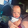 Ramontez joined the competition — help win amazing prizes! baby, child, blue_eyes, car_interior, car_seat, sunlight, person, arm, clothing, blanket, bottle, window, seatbelt, skin, face, hand, infant, holding, transportation, vehicle