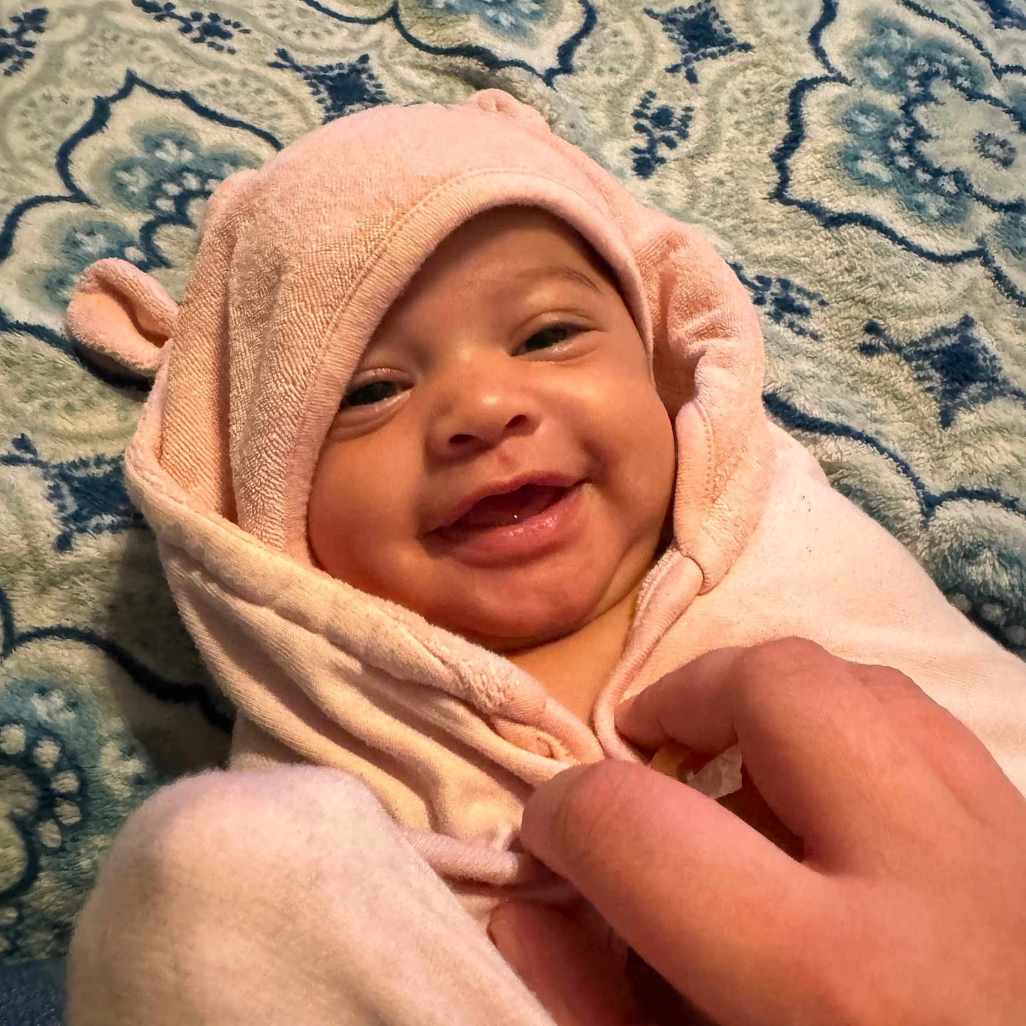 Kehlani is registered to the contest to win money with this photo: baby, babylaughing, blanket, bodypart, bonnet, clothing, face, finger, hand, happy, hat, head, hood, newborn, person, photography, portrait, quilt, smile, towel