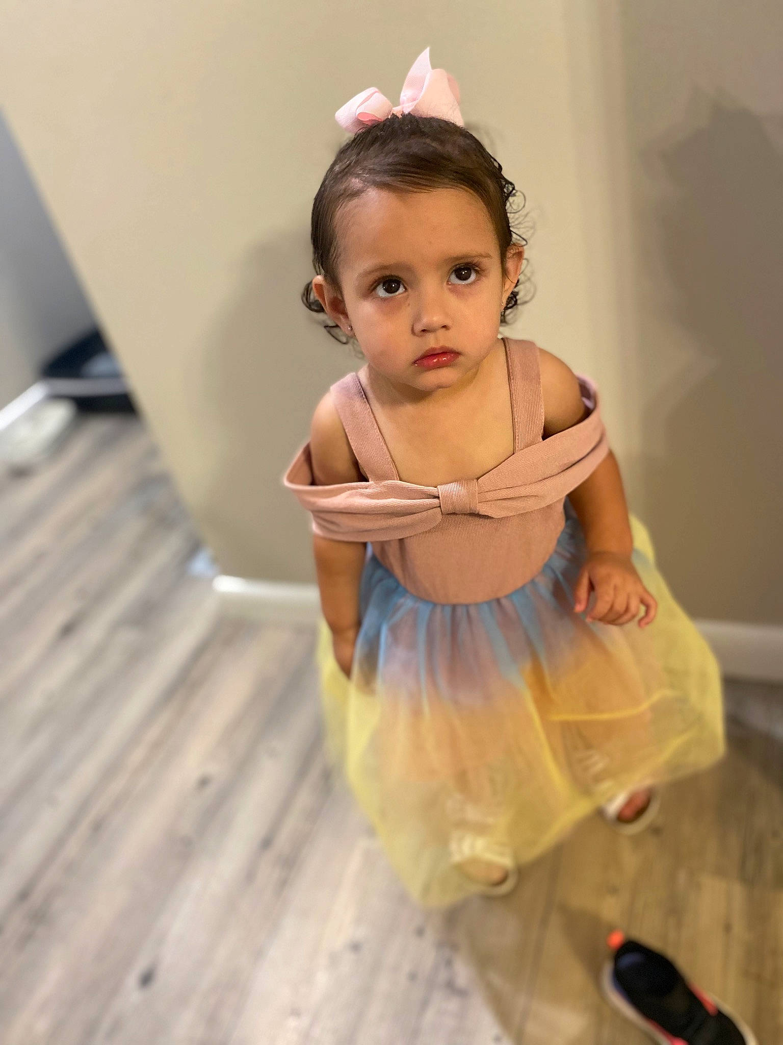 Emberlee is registered to the contest to win money with this photo: baby, baby_toddler_clothing, child, dress, fashion_accessory, fashion_design, flash_photography, flooring, fun, happy, hardwood, head, headpiece, jewellery, person, room, skin, sleeve, smile, toddler