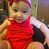Brinlee joined the competition — help win amazing prizes! baby, child, red_outfit, headband, smiling, indoor, person, human, cute, infant, portrait, happy, skin, arms, legs, hand, face, eyes, clothing, holding