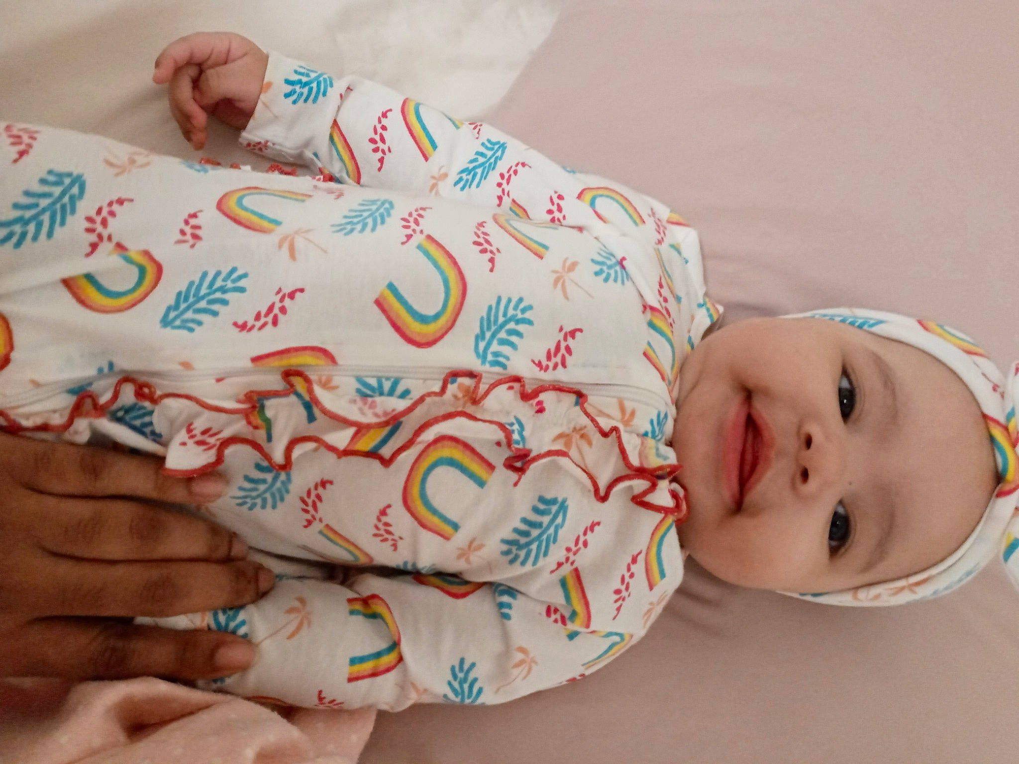 Zendaya is registered to the contest to win money with this photo: baby_toddler_clothing, cheek, comfort, eye, face, finger, happy, head, headwear, human_body, joint, lip, mouth, muscle, neck, nose, person, pink, skin, sleeve