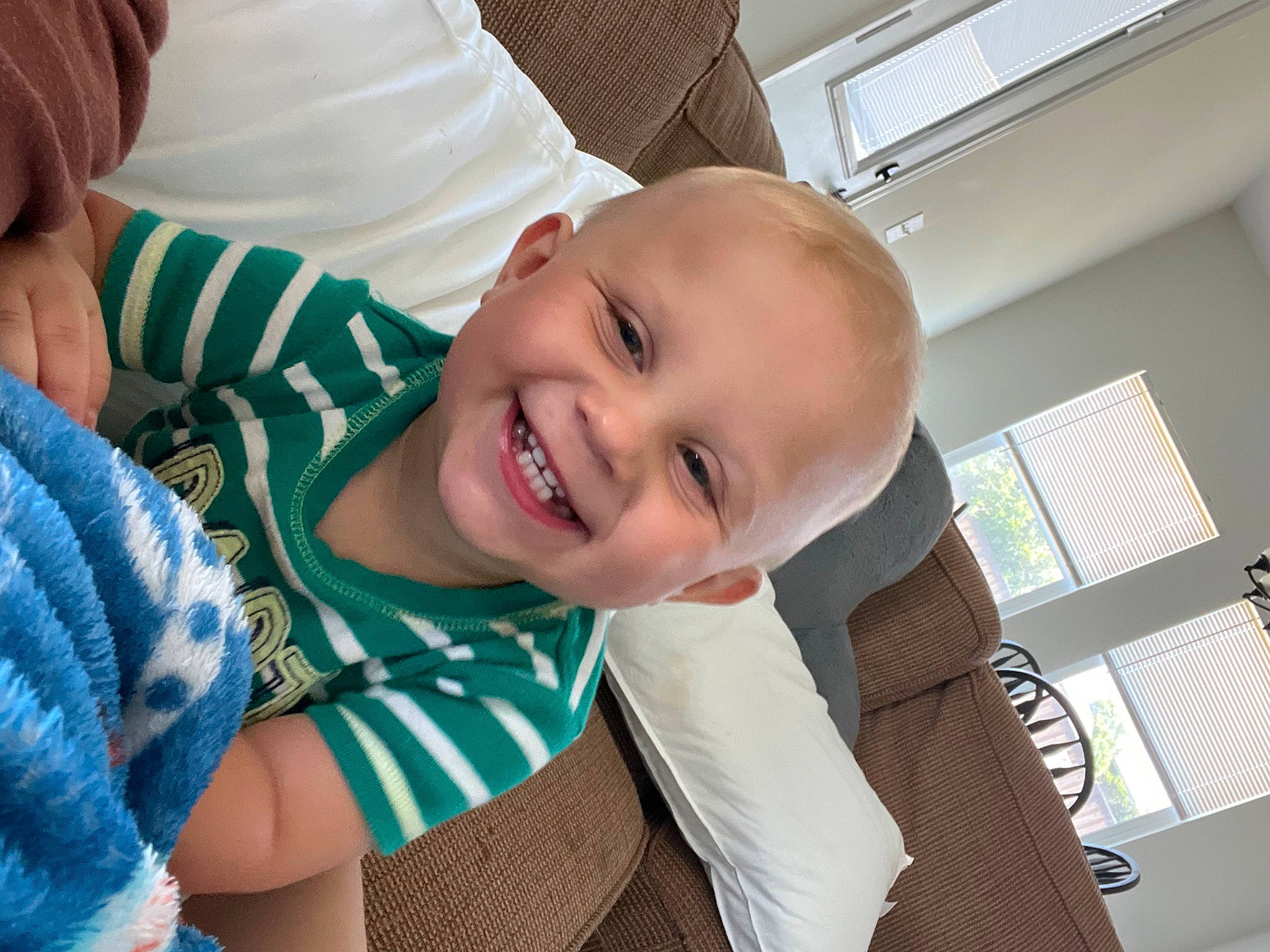 Malakai is registered to the contest to win money with this photo: baby, baby_toddler_clothing, cheek, chin, comfort, eyebrow, facial_expression, finger, fun, gesture, hairstyle, happy, iris, joy, mouth, nose, person, skin, smile, toddler