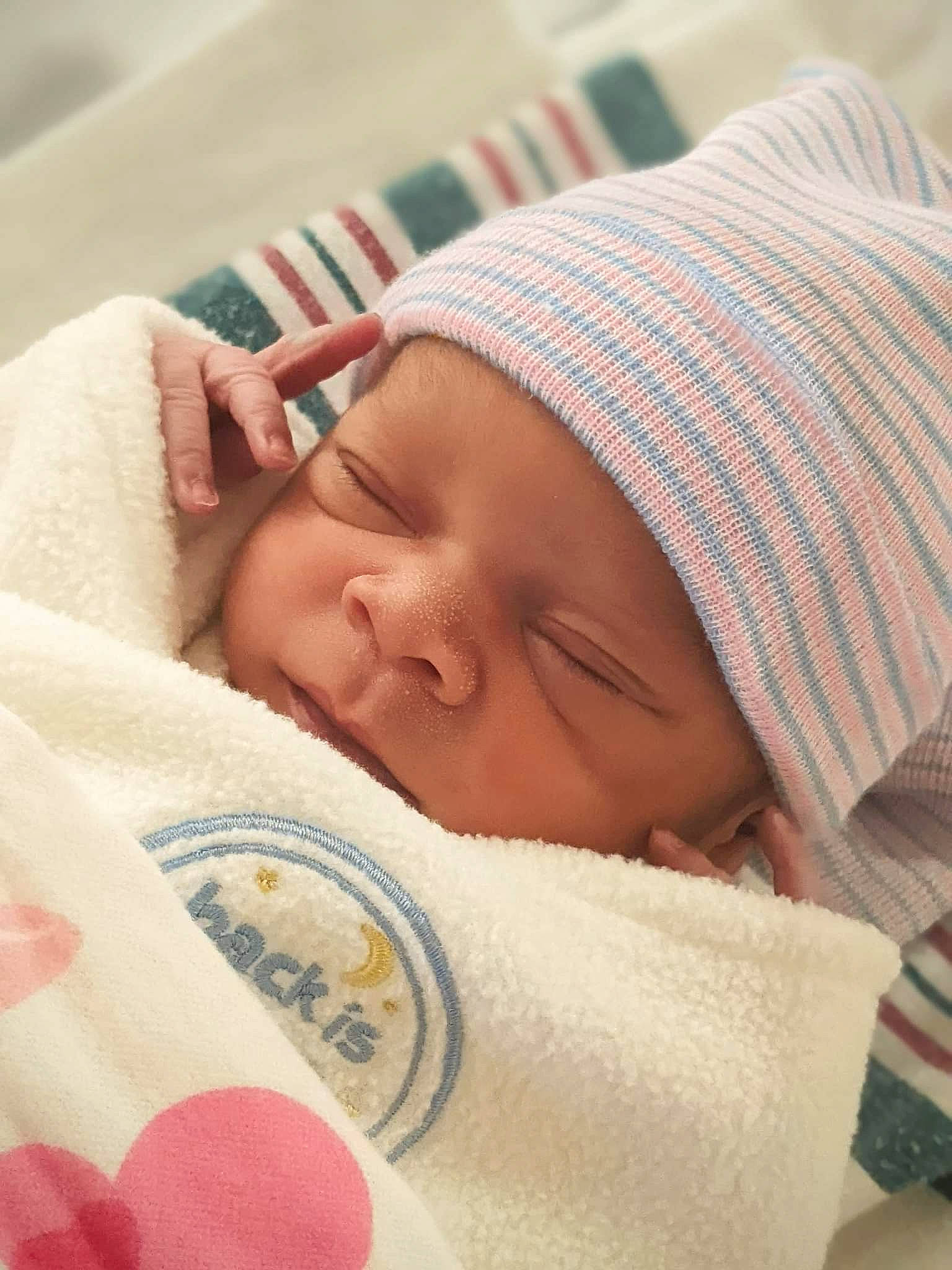 Aubrie joined the competition — help win amazing prizes! baby, baby_sleeping, bedtime, cheek, child, chin, close_up, comfort, face, facial_expression, finger, head, headwear, linens, nose, organ, person, product, skin, textile