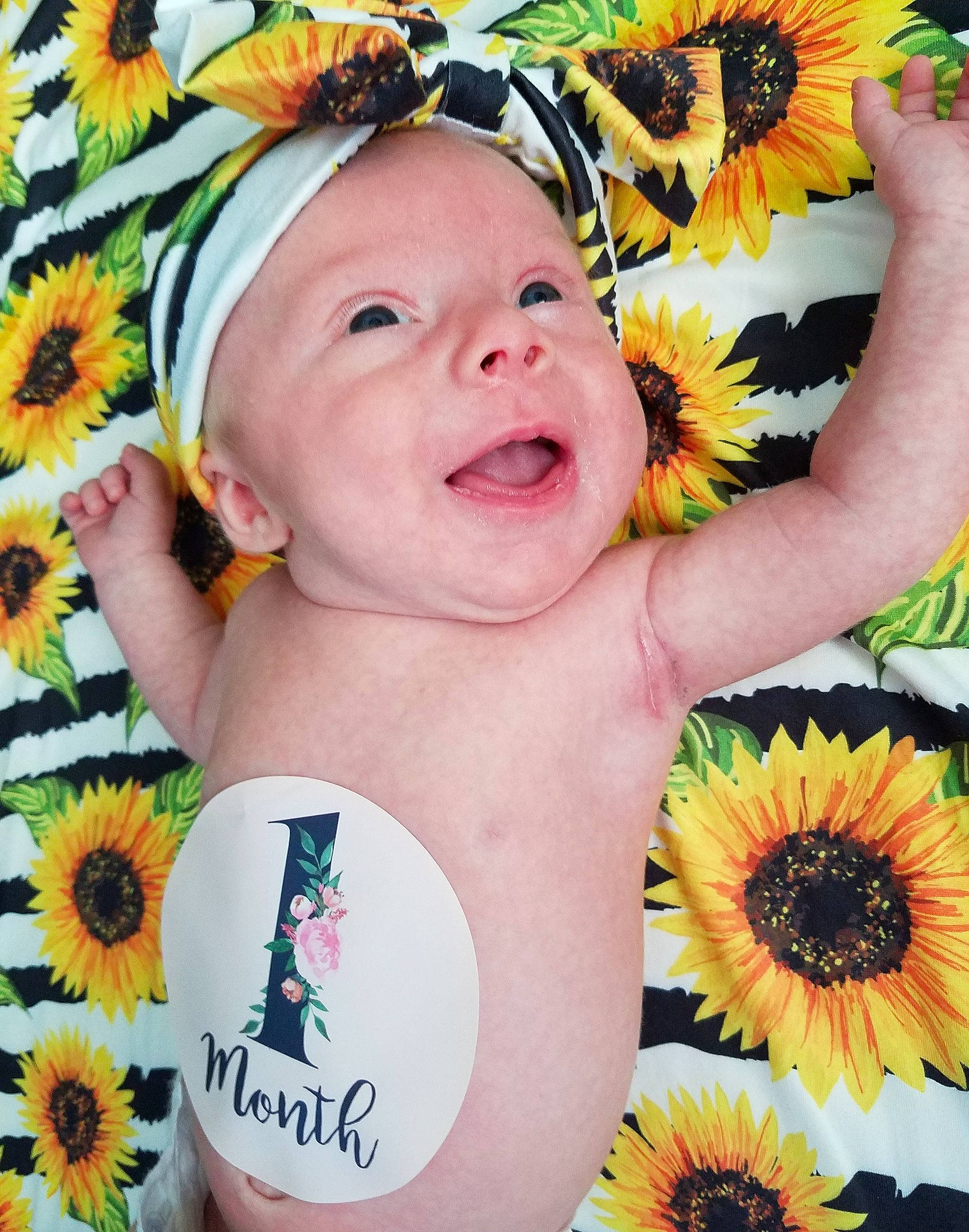 Anabell is registered to the contest to win money with this photo: asterales, baby, baby_toddler_clothing, child, costume_accessory, daisy_family, fashion_accessory, flower, hair_accessory, happy, headband, headgear, headpiece, person, plant, product, sunflower, toddler, wildflower, yellow