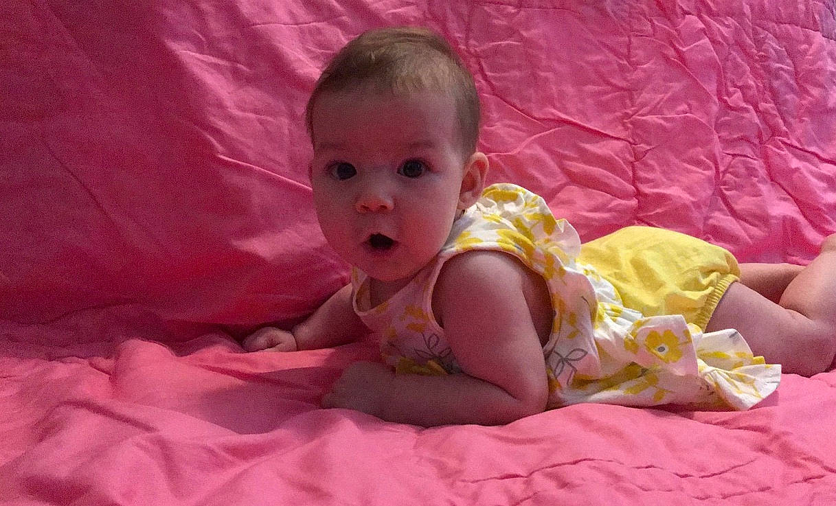 Brianna joined the competition — help win amazing prizes! baby, bedtime, cheek, child, eye, finger, fun, head, mouth, person, pink, play, skin, surprise, textile, thumb, toddler