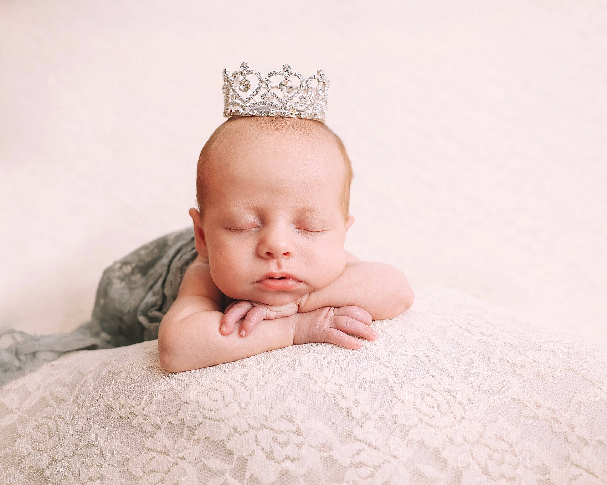 Raelynn is registered to the contest to win money with this photo: baby, baby_sleeping, baby_toddler_clothing, bedding, chin, comfort, crown, ear, fashion_accessory, finger, happy, headband, headpiece, jewellery, linens, person, sitting, skin, thumb, tiara
