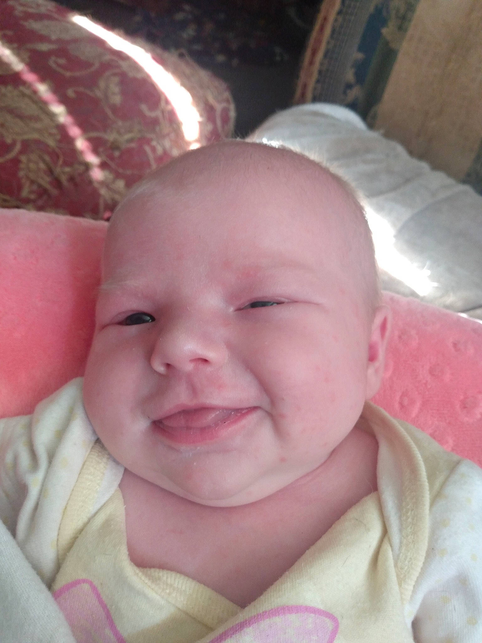 Caroline is registered to the contest to win money with this photo: baby, baby_products, baby_toddler_clothing, cheek, child, comfort, eyelash, happy, iris, linens, magenta, mouth, person, pink, skin, smile, thumb, toddler, white