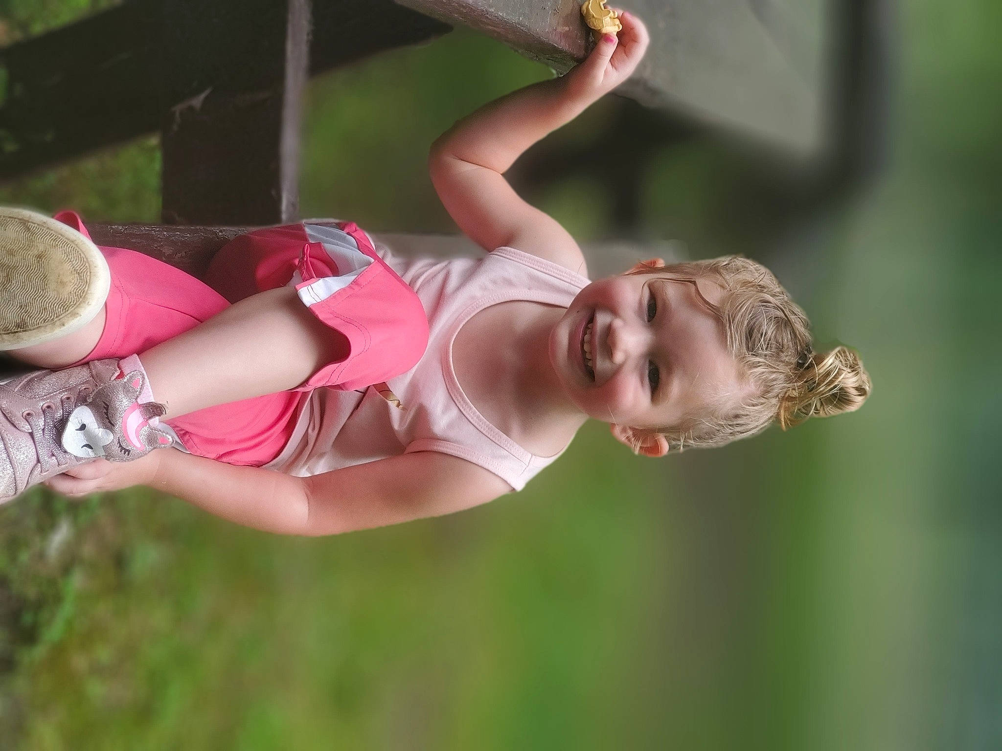 Dixie is registered to the contest to win money with this photo: abdomen, brown_hair, child, flash_photography, fun, grass, happy, human_body, human_leg, joy, leisure, people_in_nature, performance, person, plant, recreation, smile, sun_hat, thigh, tree