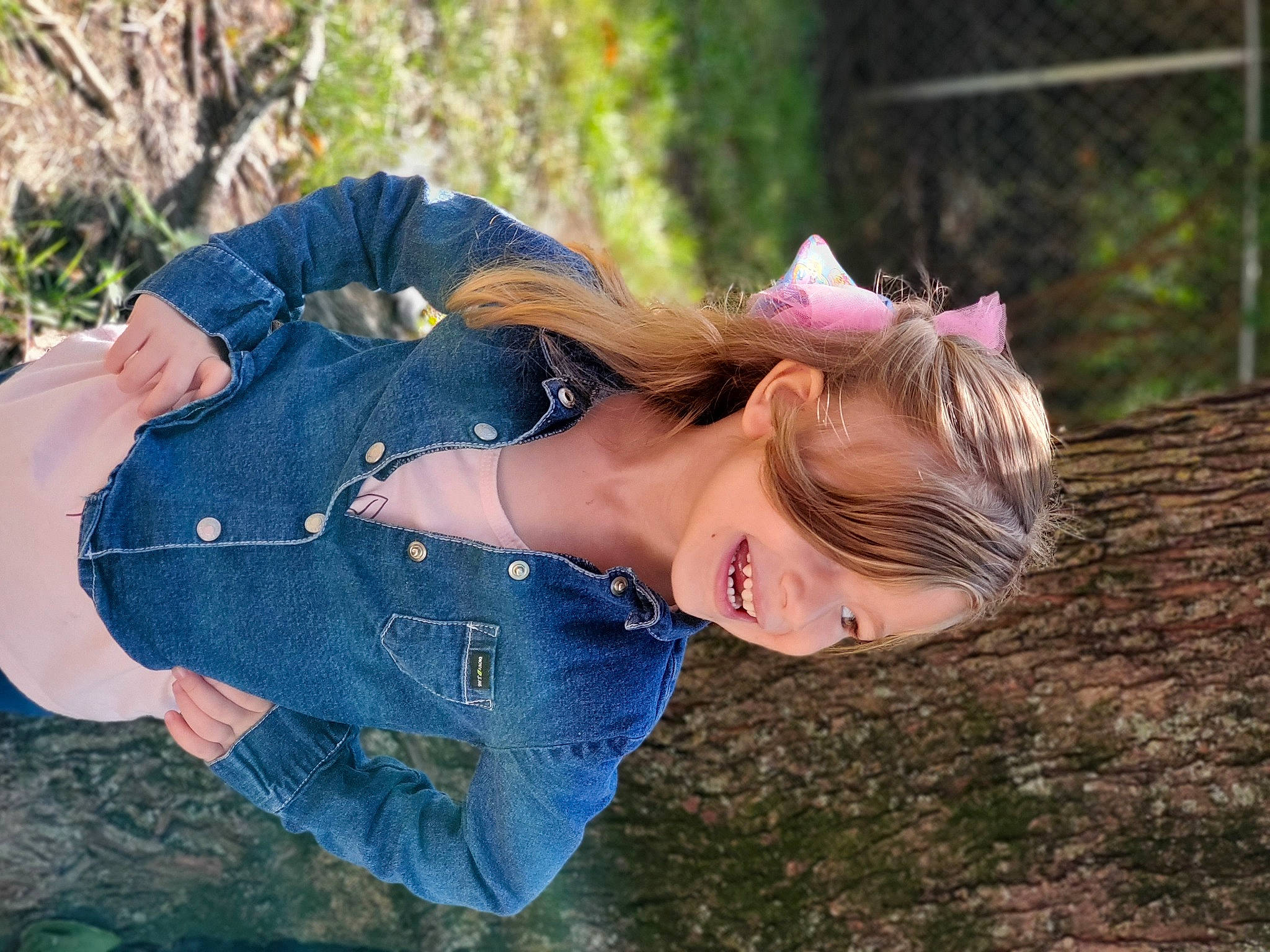 Dixie is registered to the contest to win money with this photo: beauty, blond, denim, electric_blue, flash_photography, fun, grass, happy, joy, leaf, leisure, mammal, nature, people_in_nature, person, plant, smile, textile, tree, vertebrate