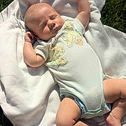 Knoxtin joined the competition — help win amazing prizes! baby, blanket, child, clothing, cute, daylight, grass, infant, limbs, nature, onesie, outdoor, peaceful, portrait, relaxing, skin, sleeping, soft, sunlight, toddler