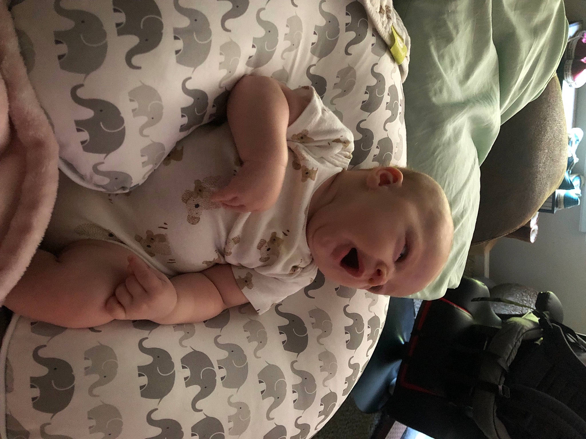 Theo is registered to the contest to win money with this photo: arm, baby, cheek, child, comfort, elbow, eye, finger, gesture, hand, head, human_body, joint, leg, mammal, mouth, people, person, skin, sleeve