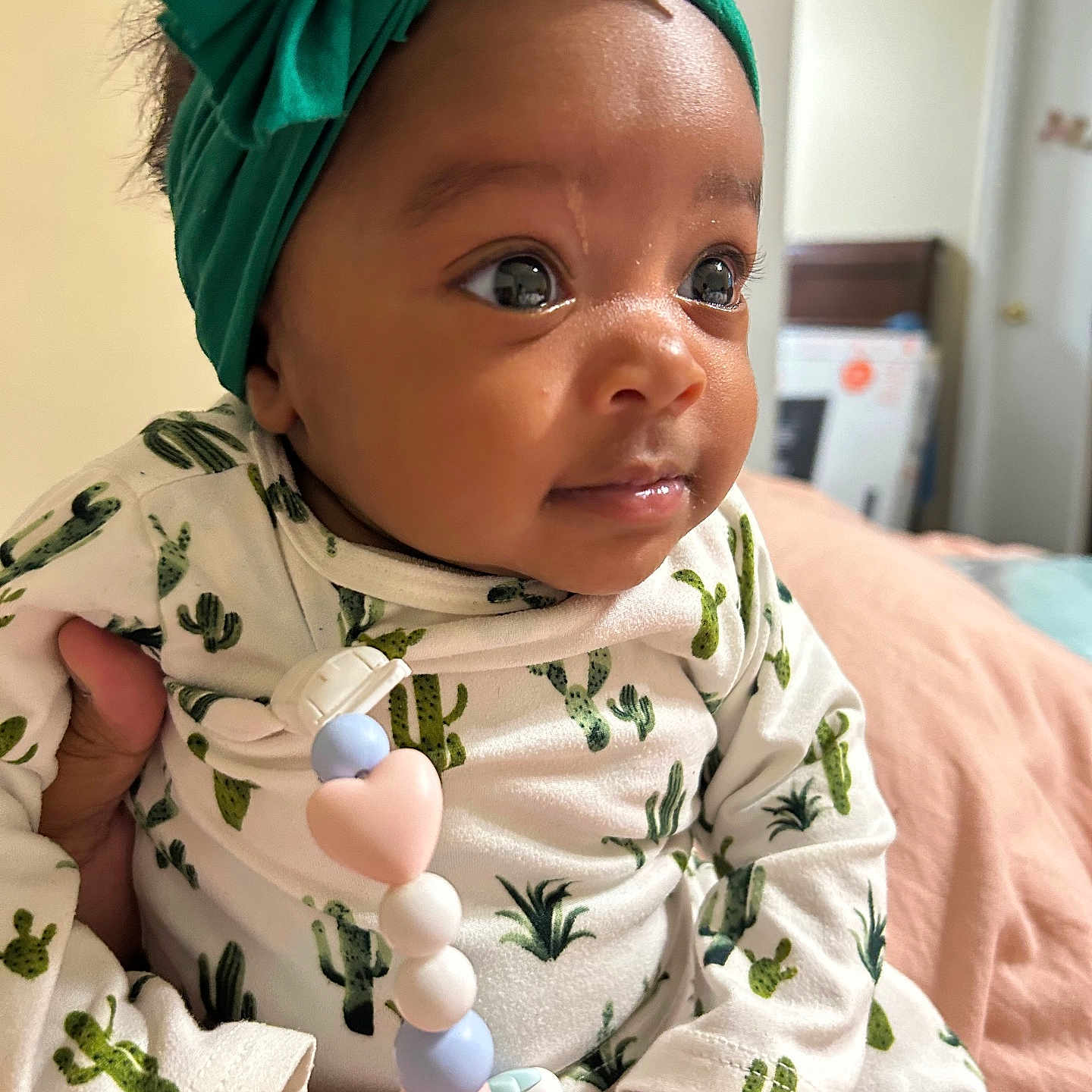 Freya is registered to the contest to win money with this photo: baby, babylaughing, biting, bonnet, clothing, crying, face, happy, hat, head, person, photography, portrait, sad, scarf, skin, smile