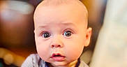 Ozzy joined the competition — help win amazing prizes! baby, blurred_background, cheeks, child, closeup, clothing, curiosity, cute, expression, eyes, face, head, indoors, infant, mouth, person, portrait, skin, soft_light, young