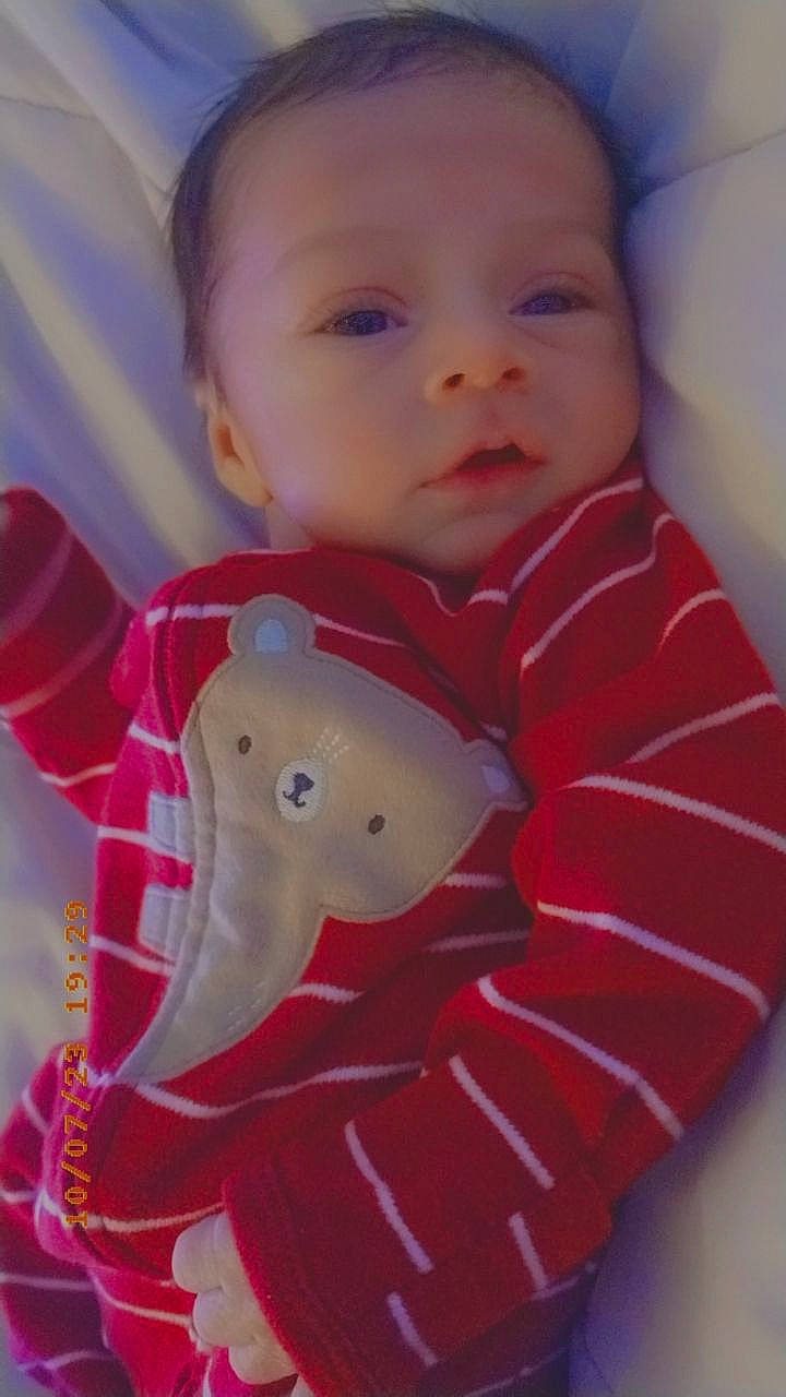 Ezekiel joined the competition — help win amazing prizes! baby, baby_products, baby_toddler_clothing, carmine, cheek, child, comfort, fictional_character, happy, linens, lip, magenta, pattern, person, pink, room, sitting, sleeve, textile, toddler