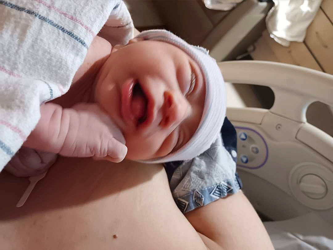 Ezekiel is registered to the contest to win money with this photo: baby, baby_products, baby_toddler_clothing, cheek, child, comfort, eyebrow, eyelash, facial_expression, family_car, finger, gesture, happy, mouth, nail, neck, nose, person, skin, thumb