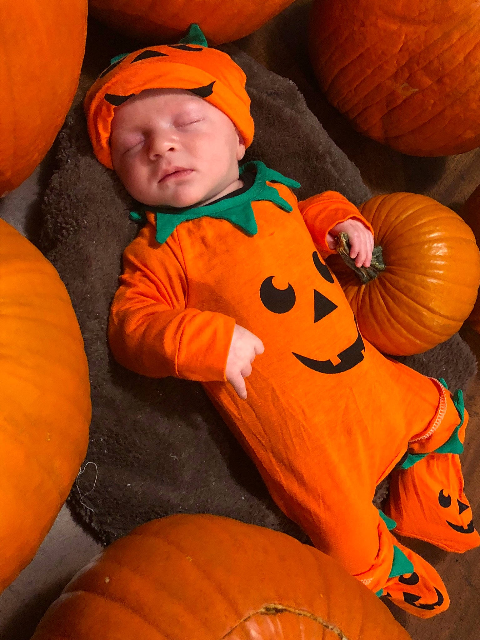 Barrett is registered to the contest to win money with this photo: calabaza, carving, child, cucurbita, fun, halloween, infant, jack_o_lantern, orange, person, pumpkin, smile, squash, toddler, winter_squash