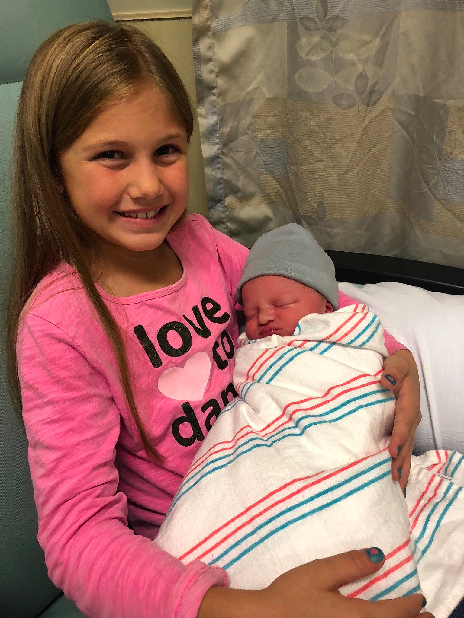 Haylie joined the competition — help win amazing prizes! abdomen, arm, child, day, fun, girl, headwear, human_hair_color, infant, joy, leg, mother, mouth, organ, person, pink, product, shoulder, sitting, skin