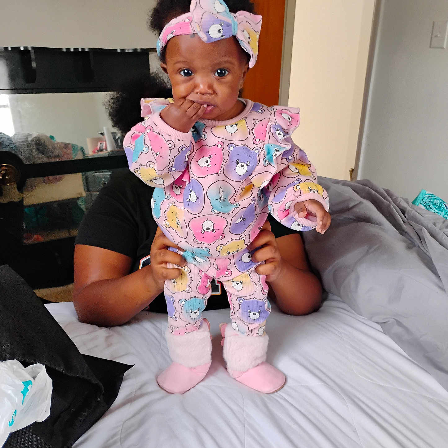 Ke'Mani Marie Wisham is registered to the contest to win money with this photo: accessories, baby, bag, bed, bodypart, clothing, couch, face, finger, furniture, hand, handbag, hat, head, person, photography, portrait, sitting, toy, wood