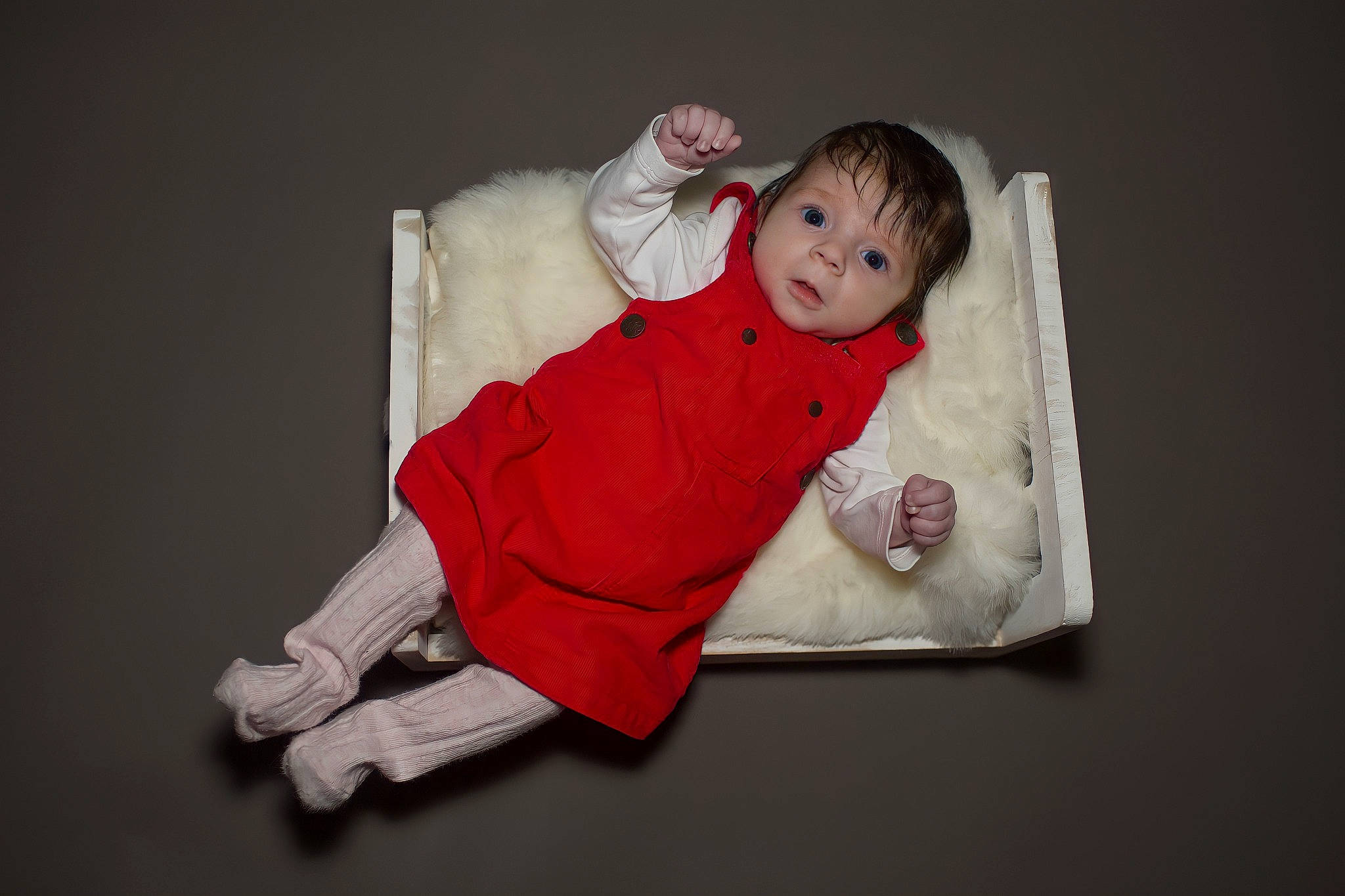Jessica is registered to the contest to win money with this photo: baby, baby_toddler_clothing, carmine, cheek, child, collar, comfort, costume, event, flash_photography, fun, fur, linens, magenta, person, portrait_photography, room, sitting, sleeve, smile