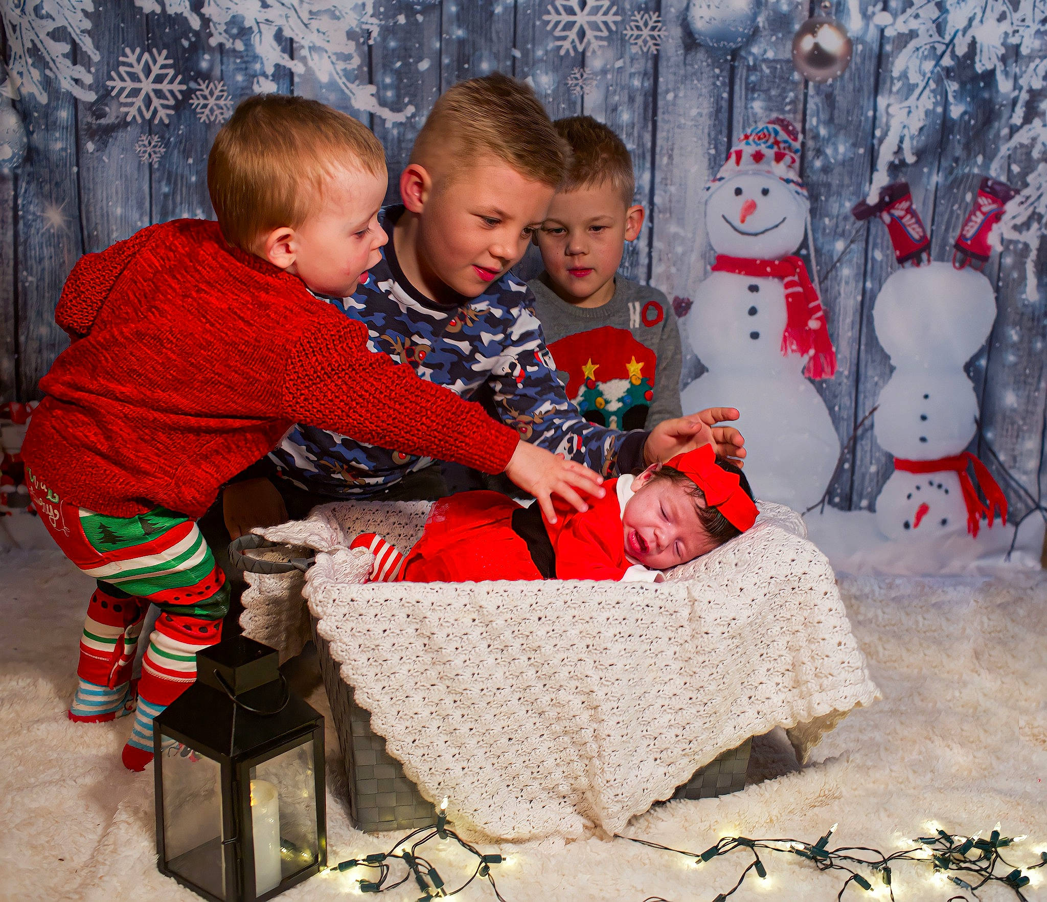 Taylor is registered to the contest to win money with this photo: baby_toddler_clothing, child, christmas, christmas_eve, christmas_ornament, event, fun, happy, holiday, interaction, lap, leisure, person, red, sharing, sitting, textile, toddler, tree, winter
