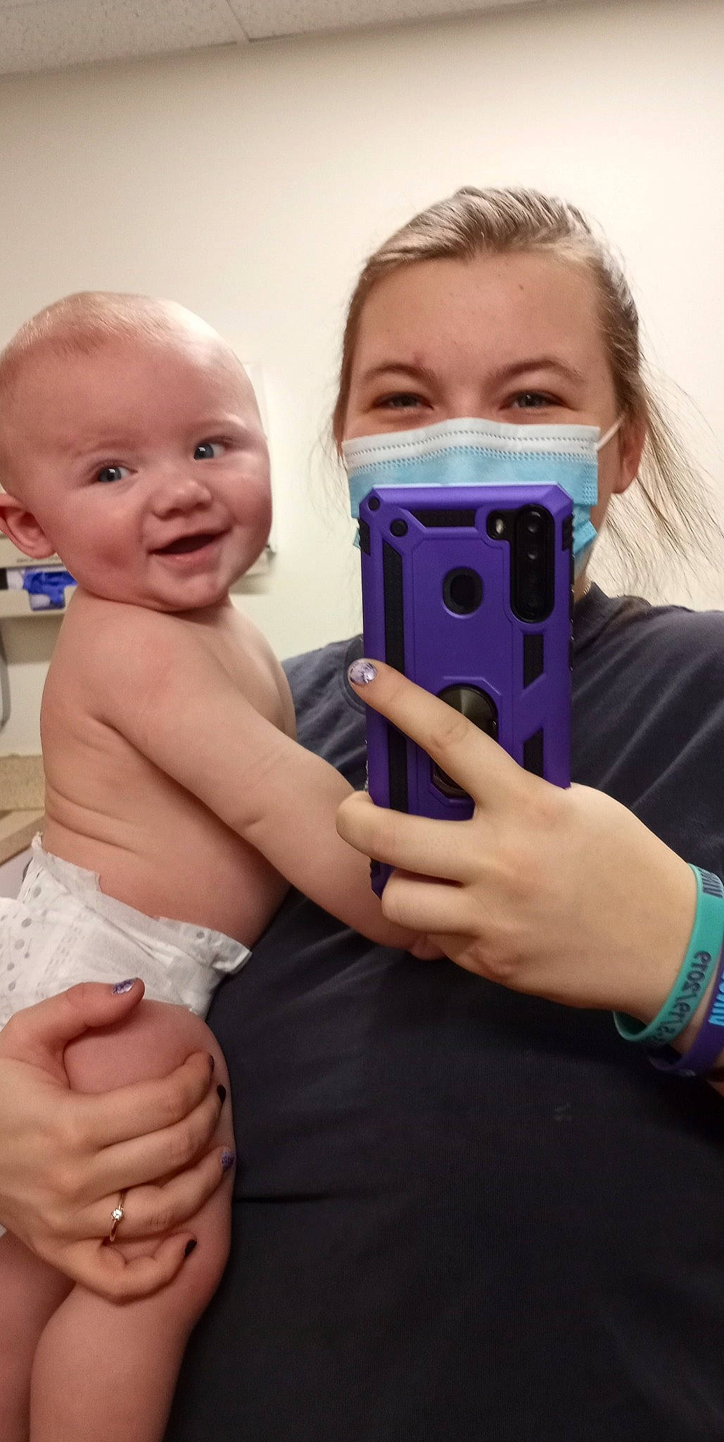 Xavyer is registered to the contest to win money with this photo: audio_equipment, azure, baby, cameras_optics, chest, child, eyebrow, eyelash, finger, gesture, hand, happy, iris, joy, lip, nail, person, pink, skin, smile