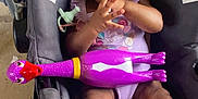 Brooke Lynn joined the competition — help win amazing prizes! architecture, bodypart, child, clothing, eating, face, female, finger, food, furniture, girl, hand, head, person, photography, portrait, purple, shorts, stroller, toy
