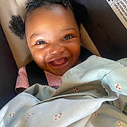Brooke Lynn is registered to the contest to win money with this photo: baby, babylaughing, blanket, face, hair, happy, head, laughing, person, photography, portrait, smile