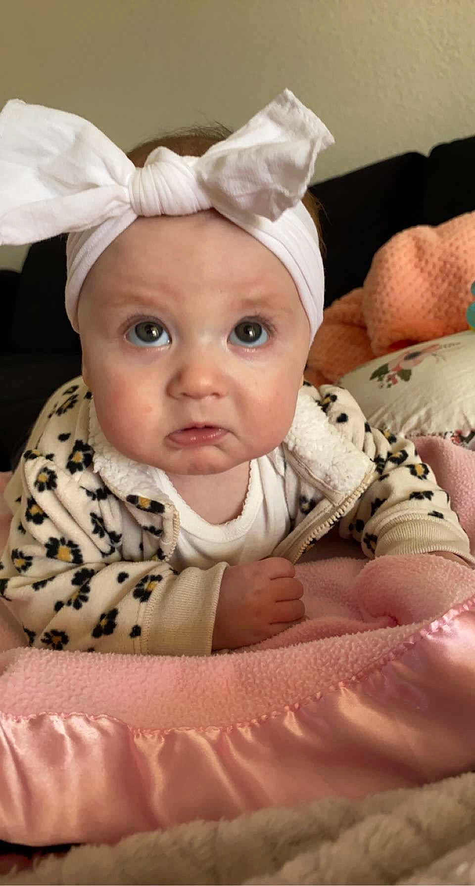 Khaleesi is registered to the contest to win money with this photo: baby, baby_sleeping, baby_toddler_clothing, cheek, child, comfort, costume_hat, ear, eye, eyebrow, happy, head, headgear, headwear, iris, linens, person, sitting, skin, sleeve