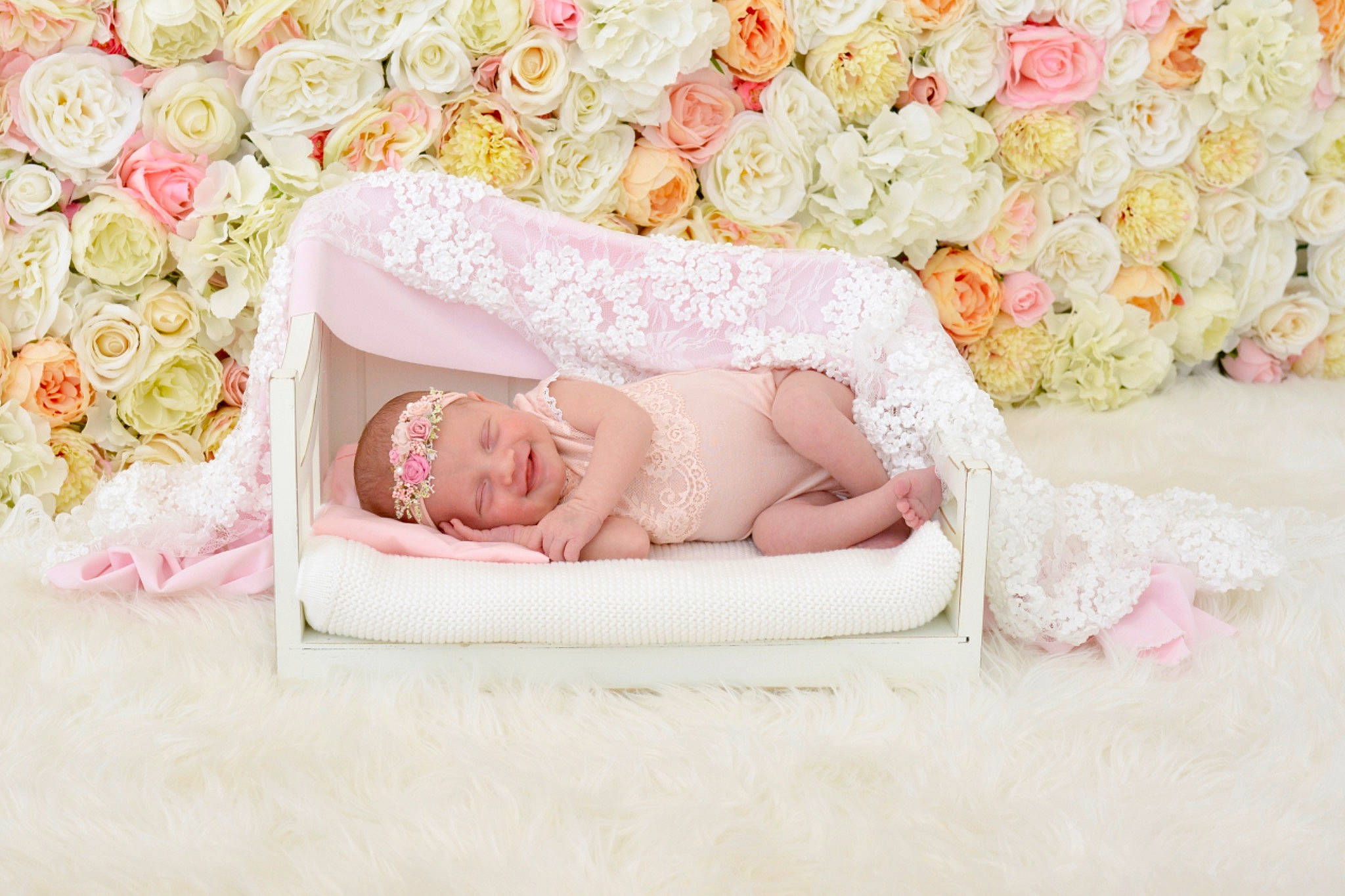 Amelia is registered to the contest to win money with this photo: baby, baby_safety, baby_sleeping, baby_toddler_clothing, bedding, bedtime, comfort, fashion_accessory, flower, hair_accessory, headgear, headpiece, headwear, joy, linens, peach, person, petal, pink, plant