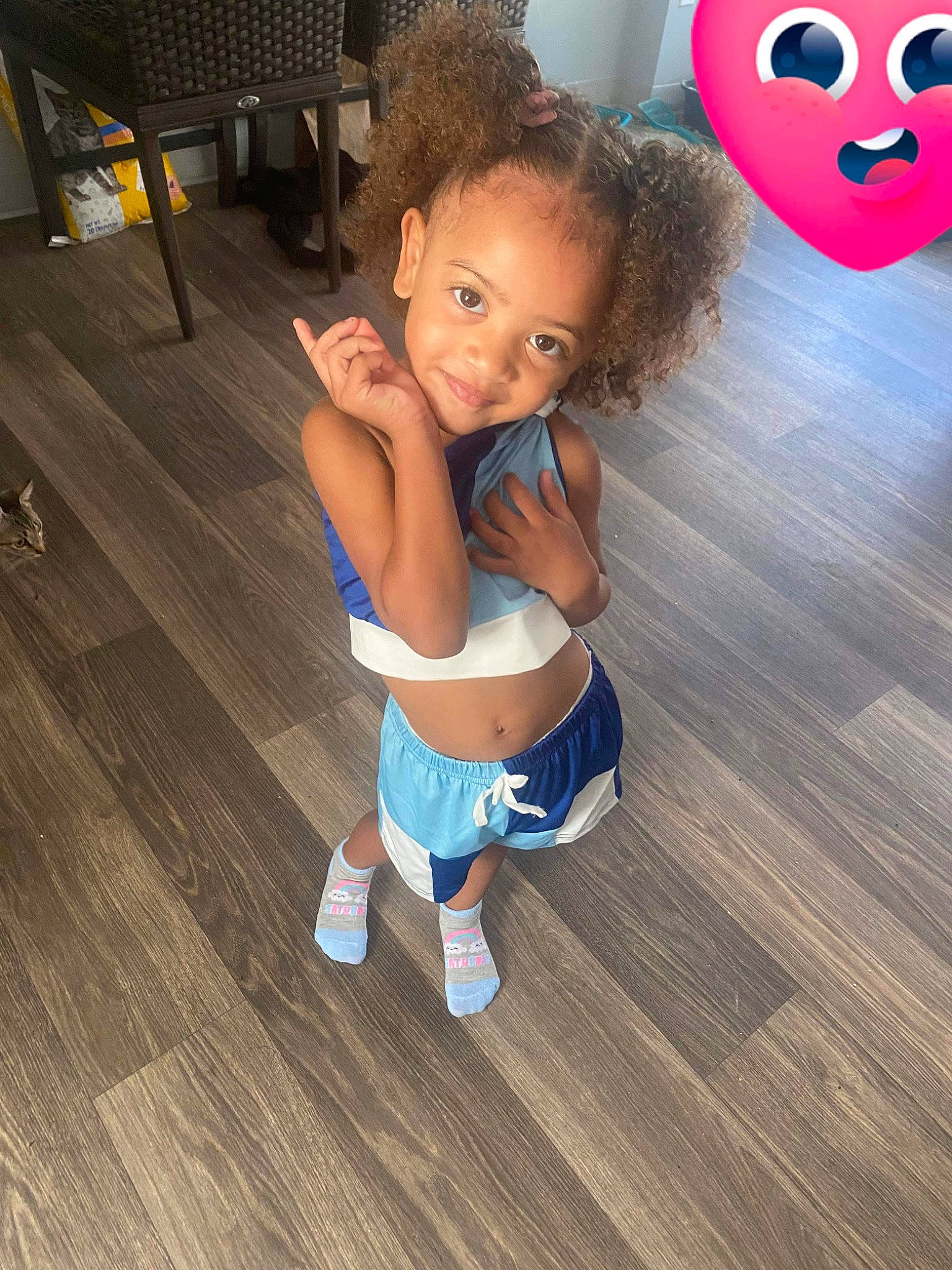 Nalaya is registered to the contest to win money with this photo: baby_toddler_clothing, eye, floor, flooring, fun, happy, hardwood, human_leg, joint, joy, knee, laminate_flooring, leg, leisure, person, smile, sock, thigh, toddler, trunk