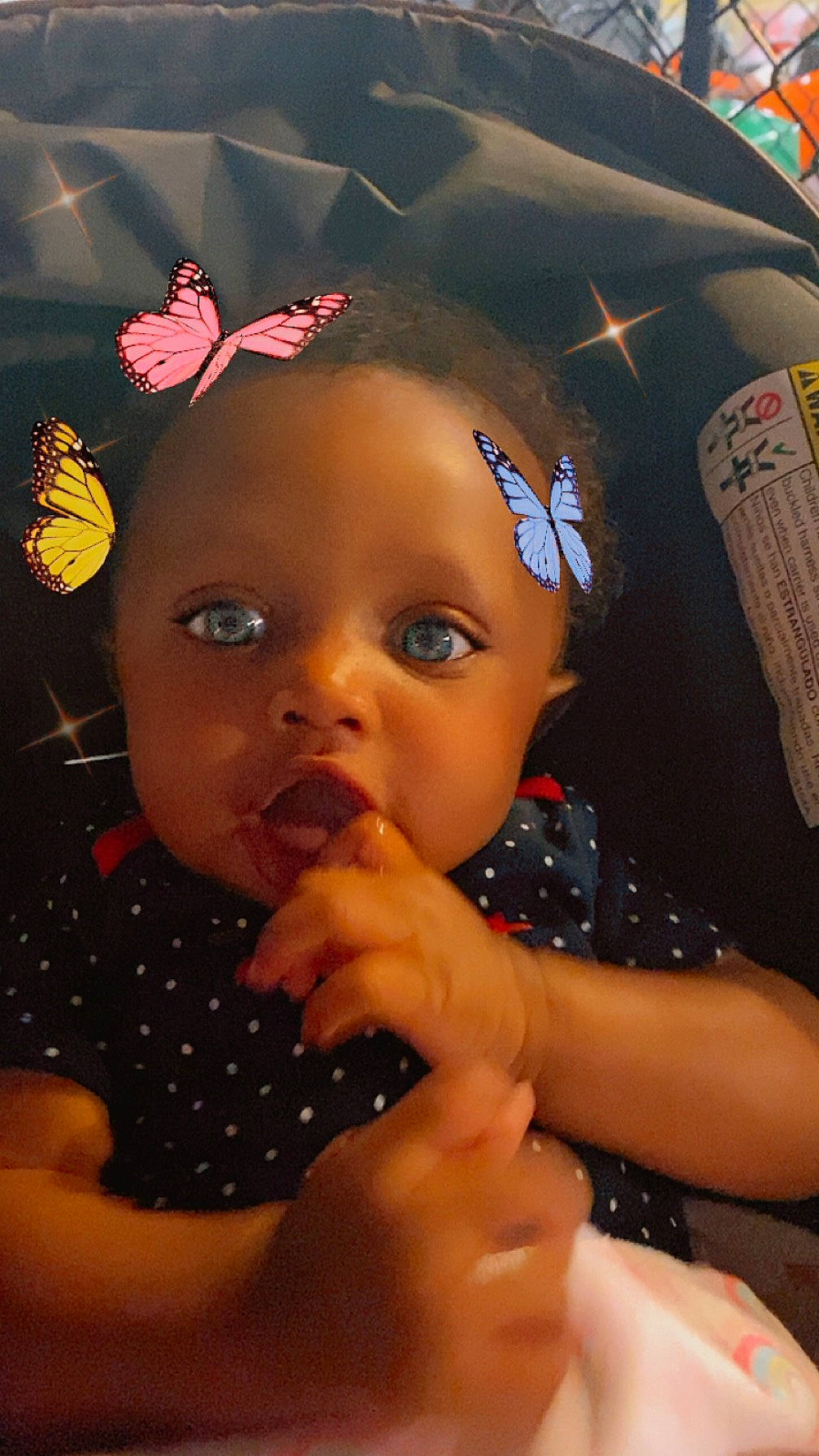 Zuri is registered to the contest to win money with this photo: baby, baby_toddler_clothing, cheek, child, eyelash, finger, flash_photography, fun, gesture, hairstyle, hand, happy, iris, lip, mouth, nail, nose, person, skin, thumb