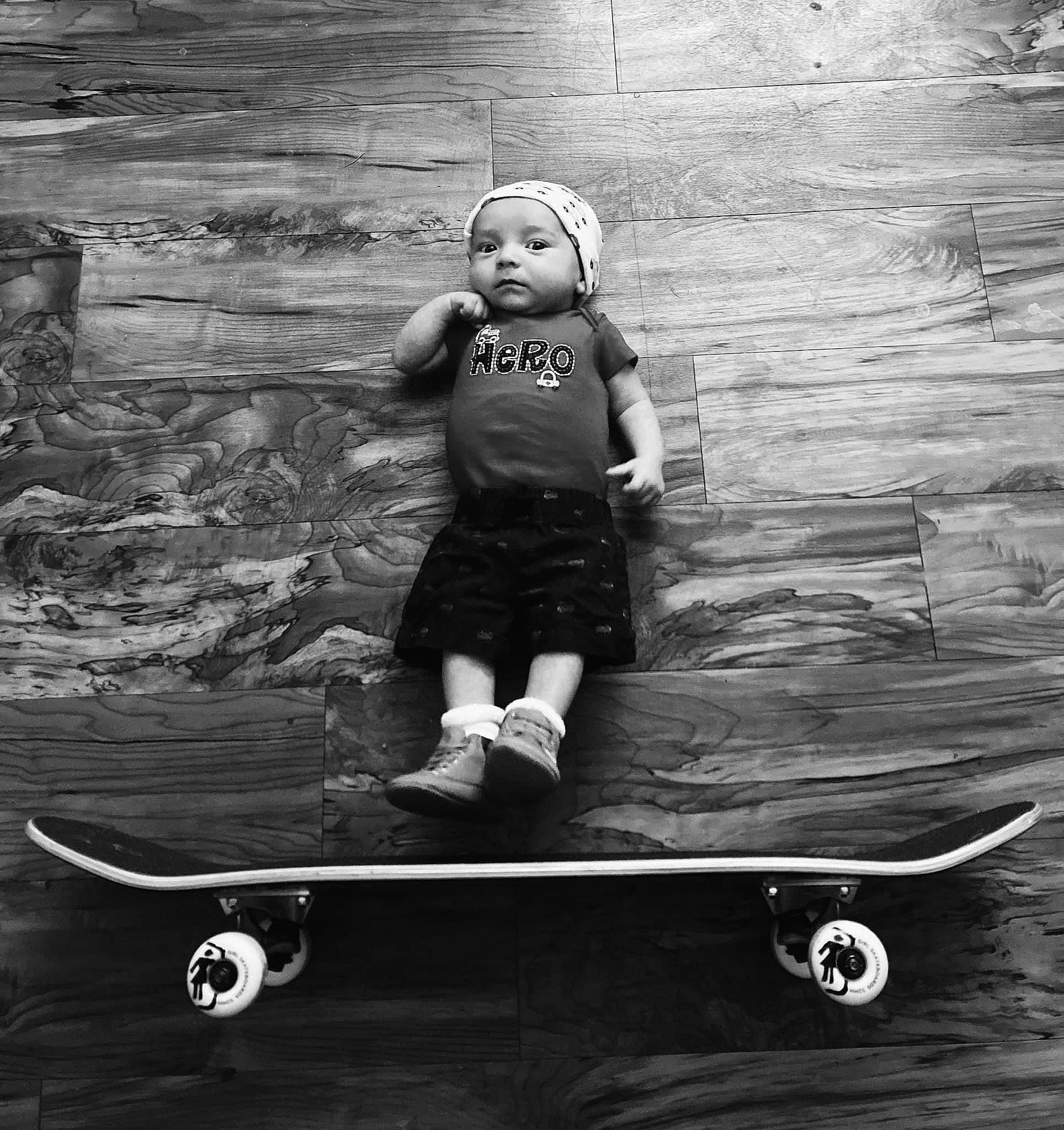 Micheal is registered to the contest to win money with this photo: black, black_and_white, composite_material, cool, headwear, line, monochrome, monochrome_photography, person, photograph, recreation, rolling, skateboard, skateboard_deck, skateboard_truck, skateboarder, skateboarding, skateboarding_equipment, sports, sports_equipment