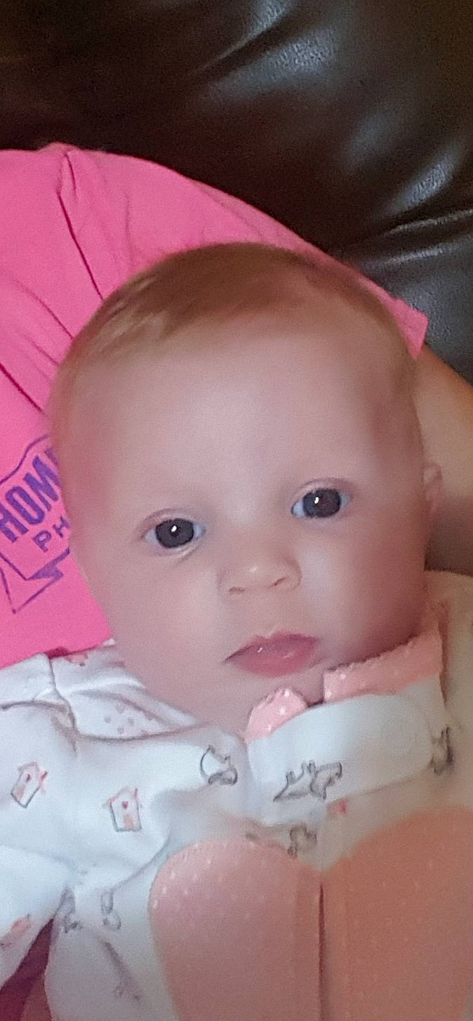 Allison is registered to the contest to win money with this photo: baby, cheek, child, chin, close_up, eye, eyebrow, face, forehead, head, iris, lip, mouth, nose, person, pink, product, skin, toddler